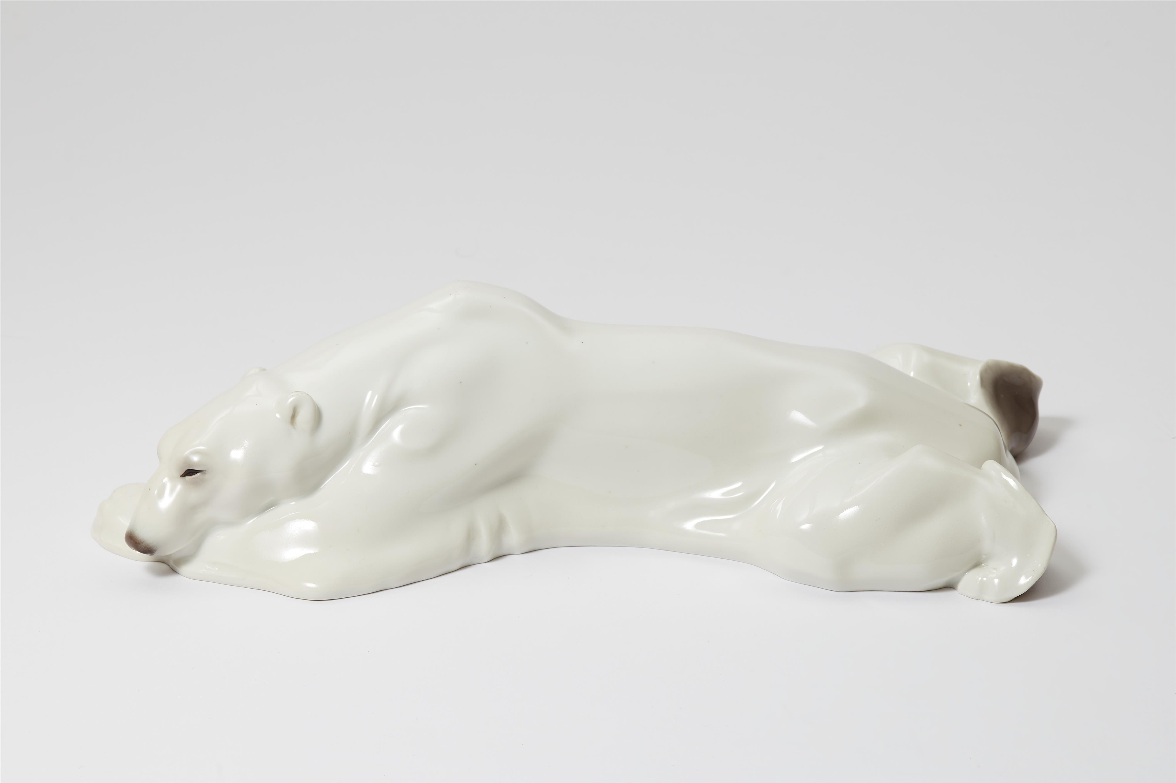 A Berlin KPM porcelain figure of a polar bear - image-1