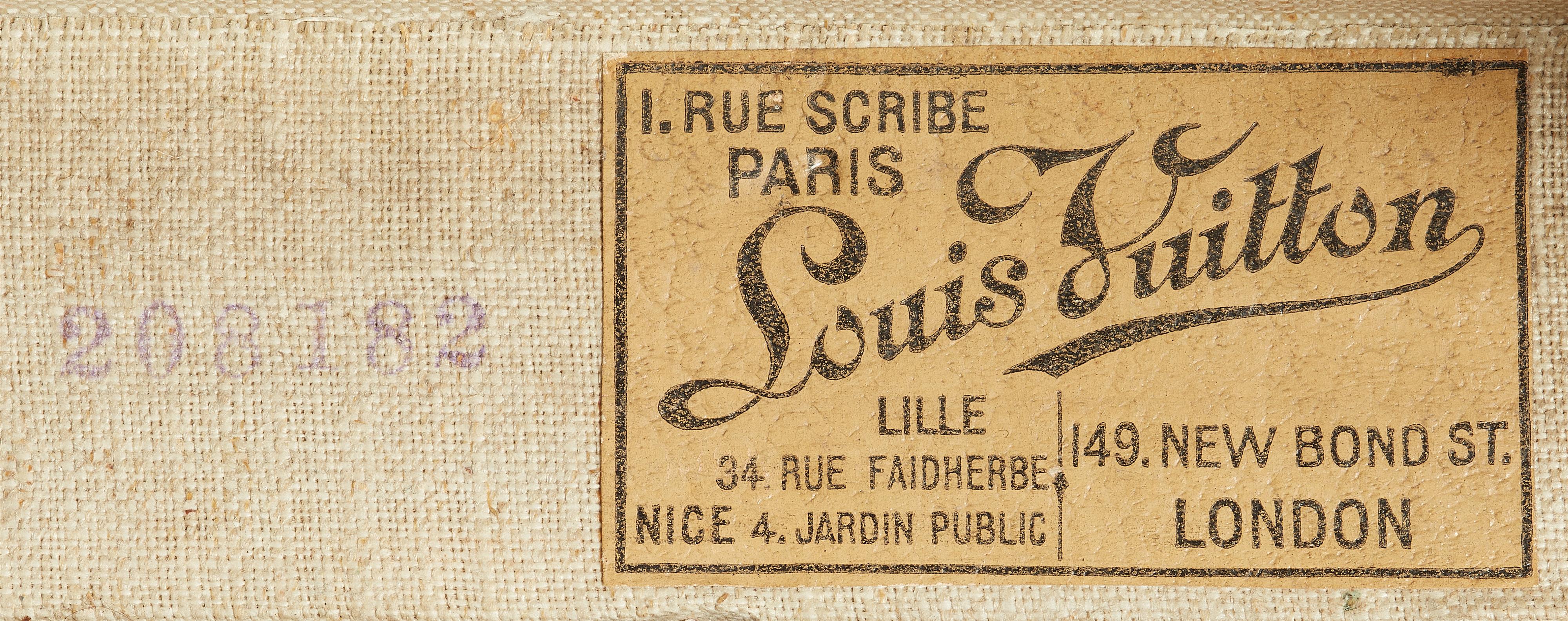 A Louis Vuitton suitcase - image-2