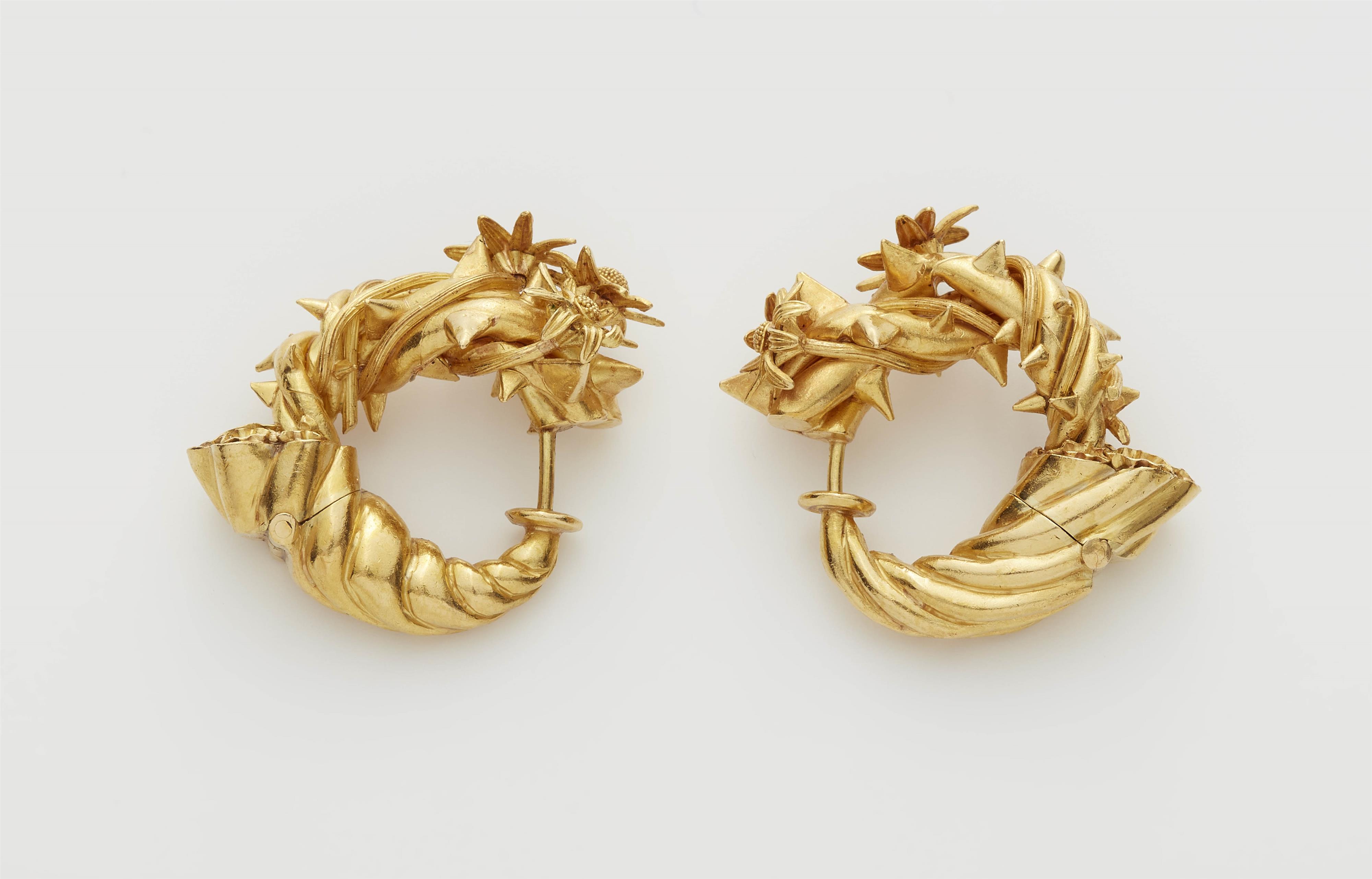 A pair of German 18k gold "cornucopia" hoop earrings. - image-1