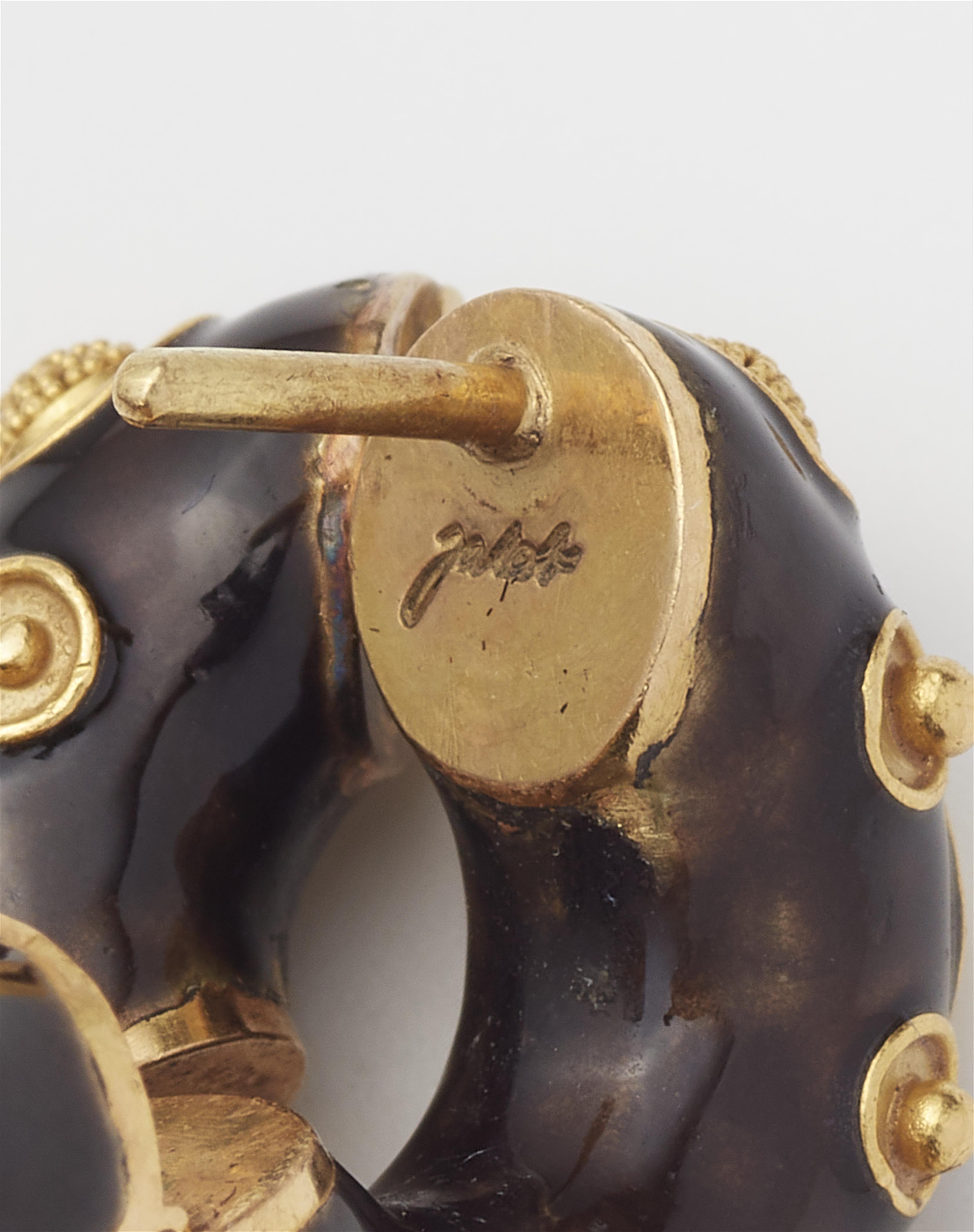 A pair of German 18k gold black enamel and granulation hoop earrings. - image-4