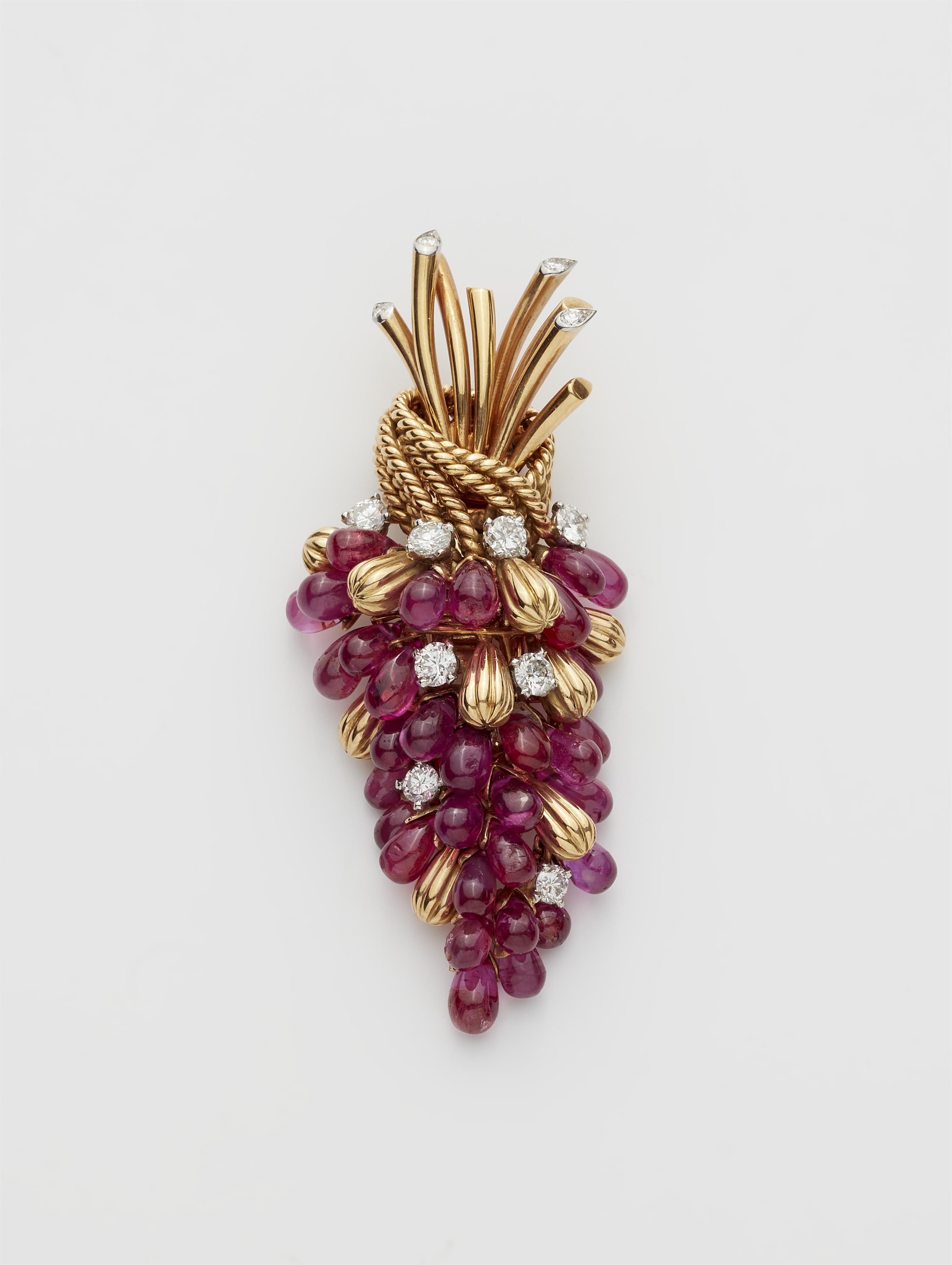 An 18k gold ruby droplet and diamond clip brooch designed as a movable bunch of grapes, can also be worn as a pendant and brooch with detachable mountings. - image-2