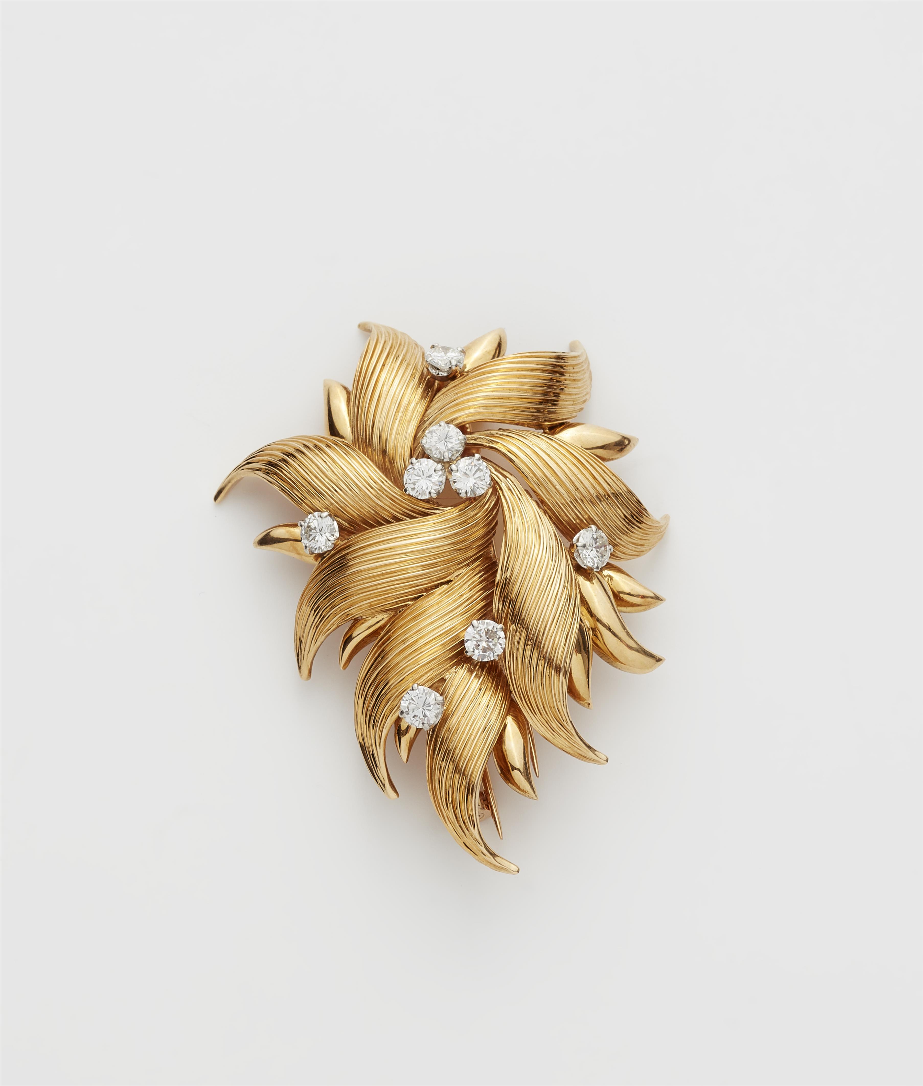 A French 18k gold and diamond Retro Style clip brooch. - image-1