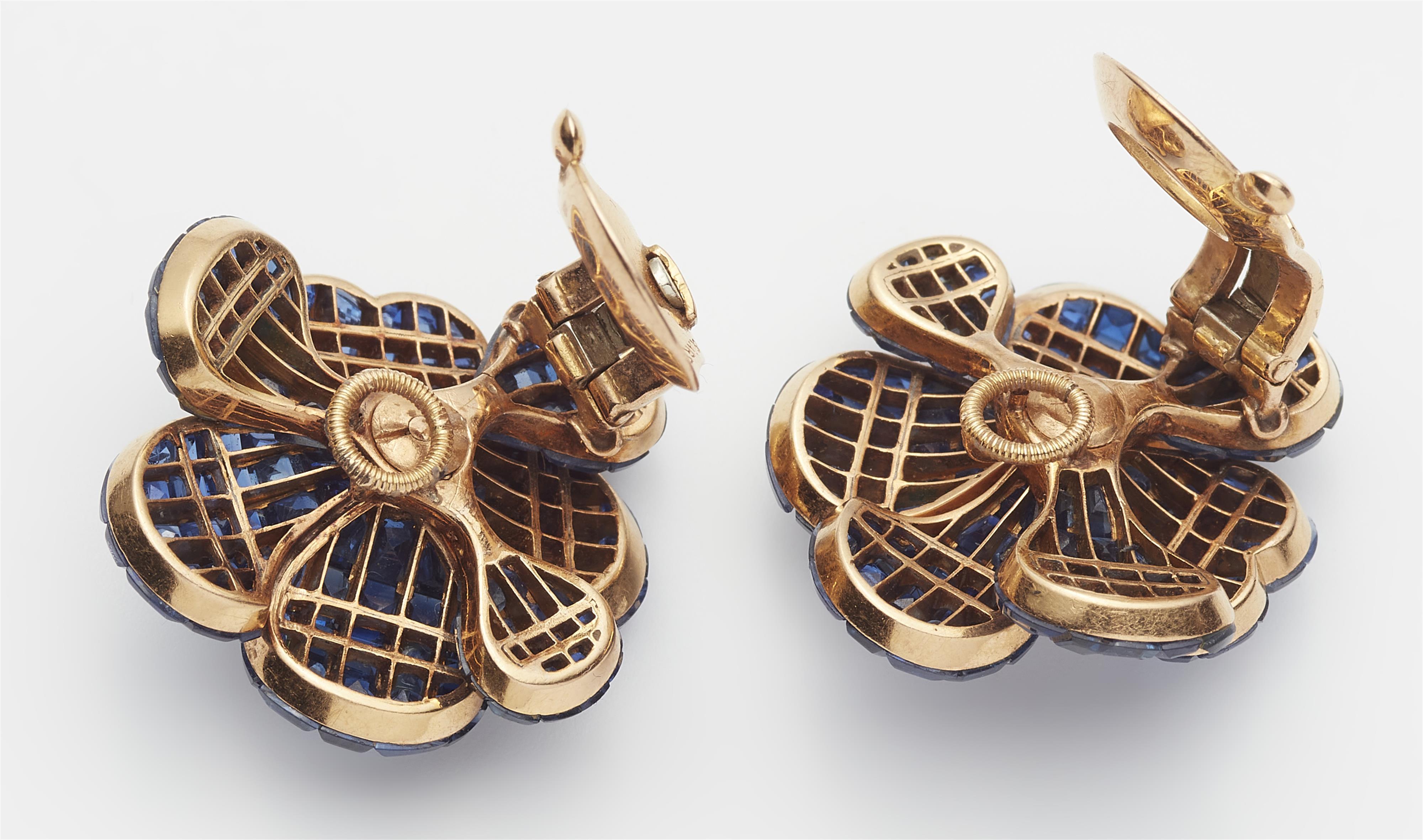 A pair of French 18k yellow gold diamond and mysterious-set sapphire "Pavot" earclips. - image-3
