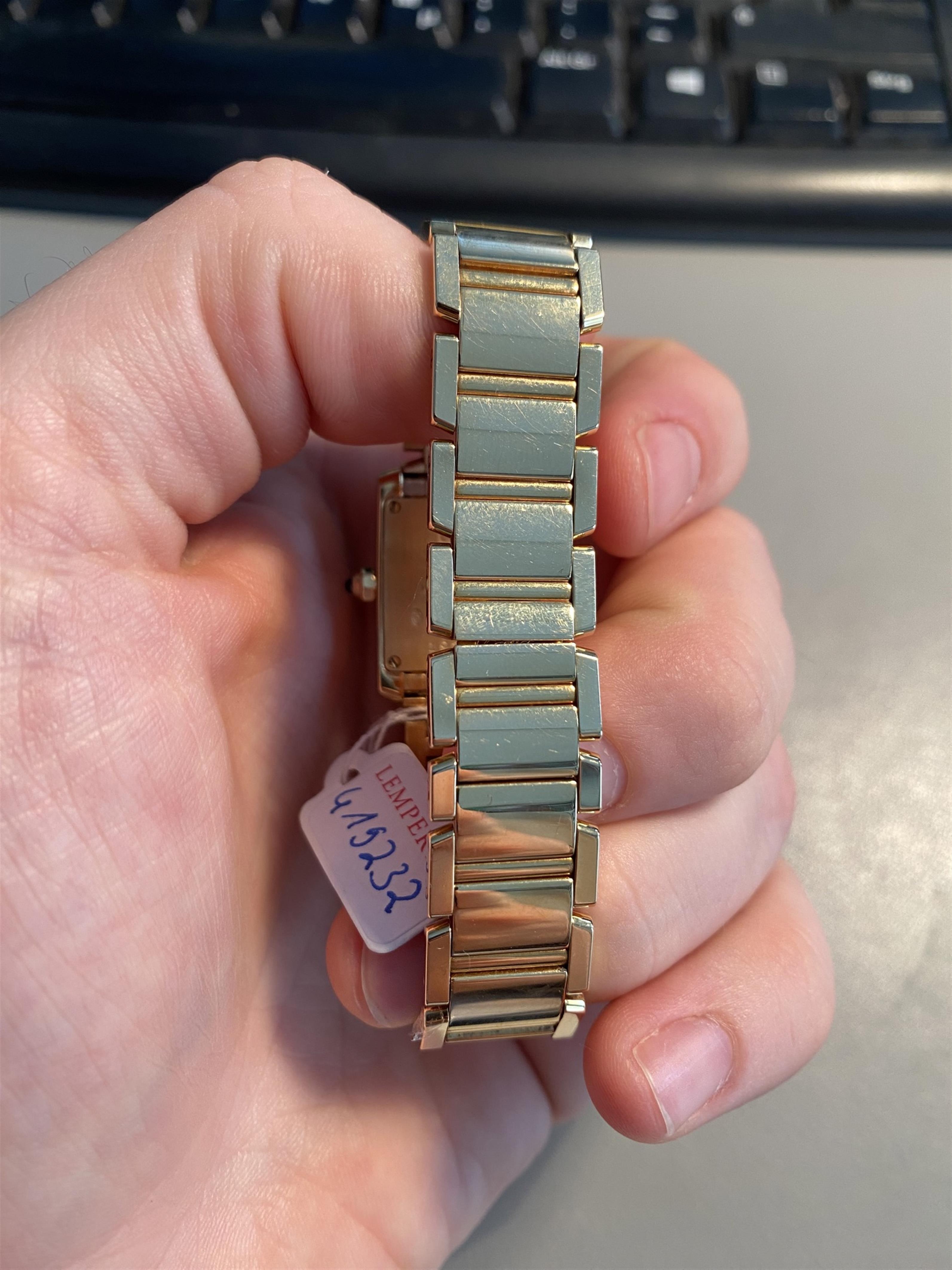 An 18k quartz Cartier Tank Française ladies wristwatch. - image-3