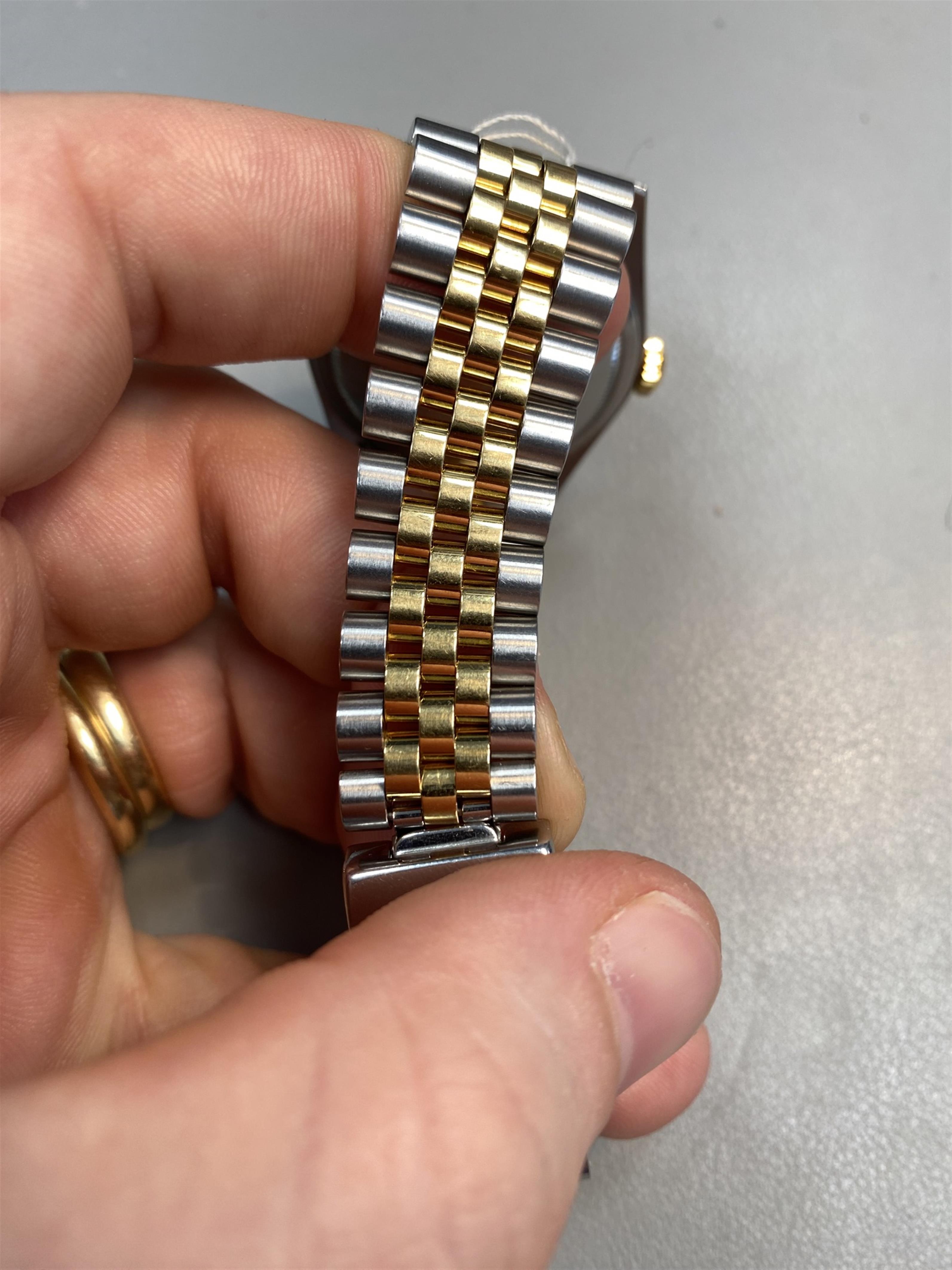 An 18k yellow gold and stainless steel automatic Rolex datejust gentleman's wristwatch. - image-4