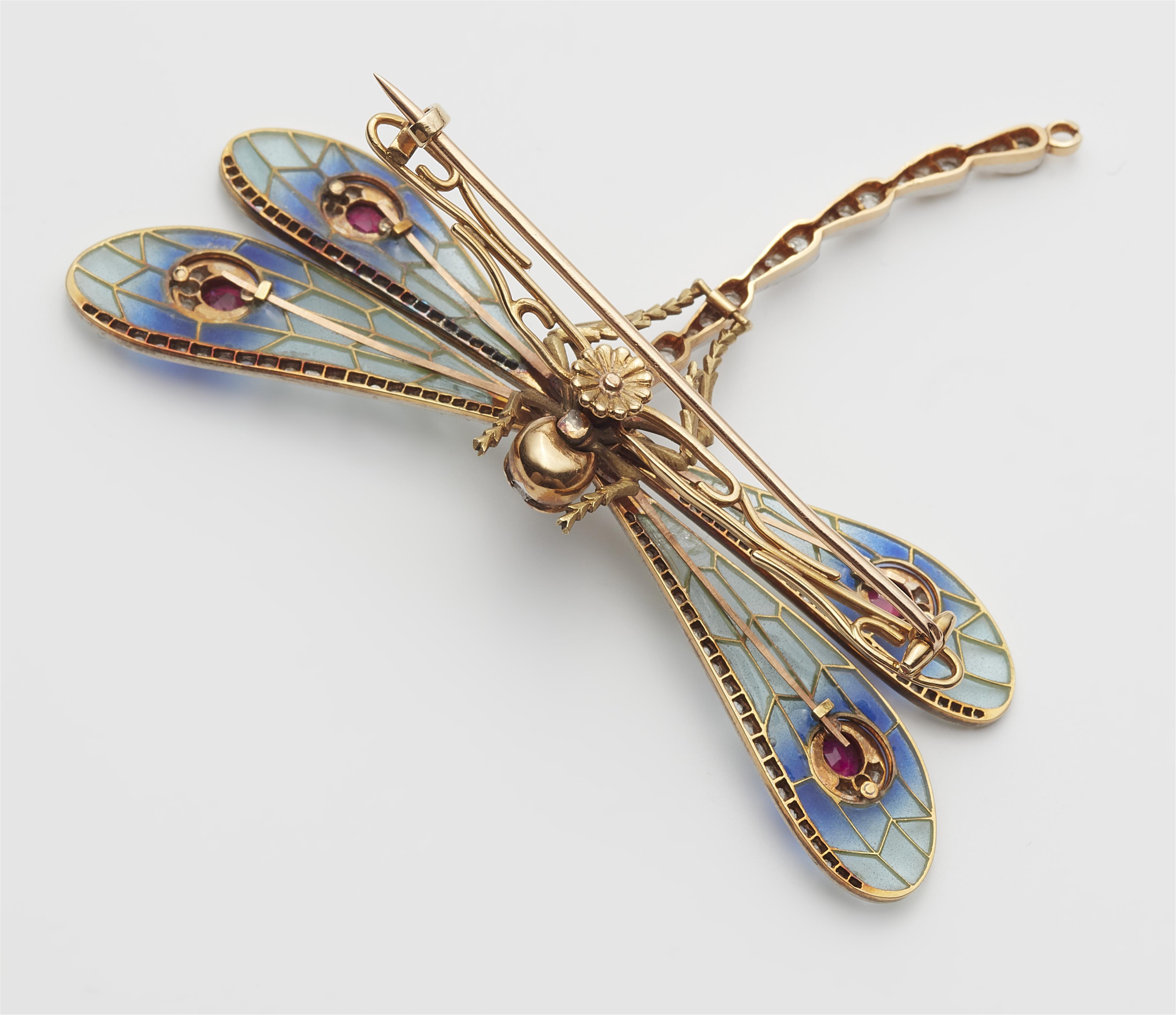 An Art Nouveau 18k gold enamel plique-à-jour diamond and ruby tremblant dragonfly brooch. - image-3