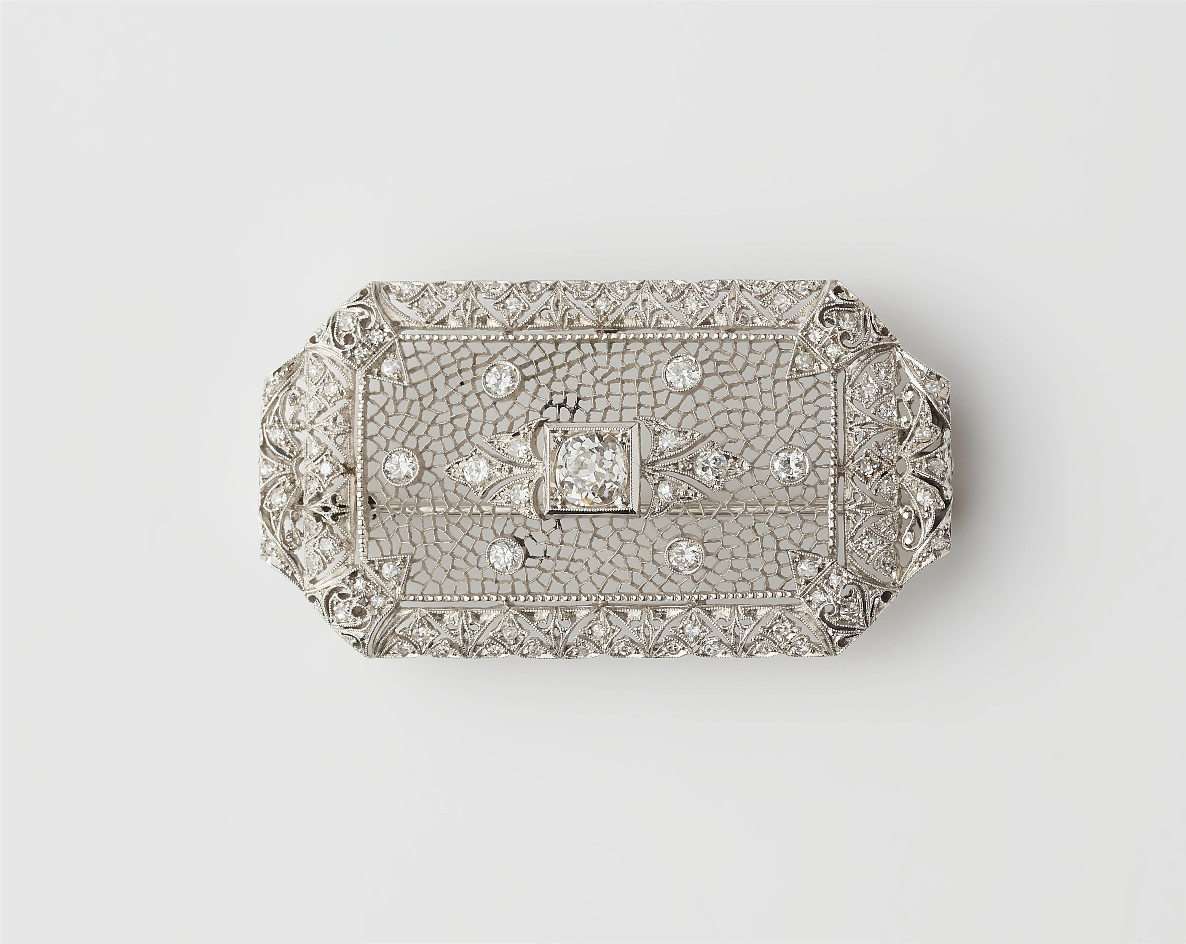 An 18k white gold and diamond Belle Epoque brooch. - image-1