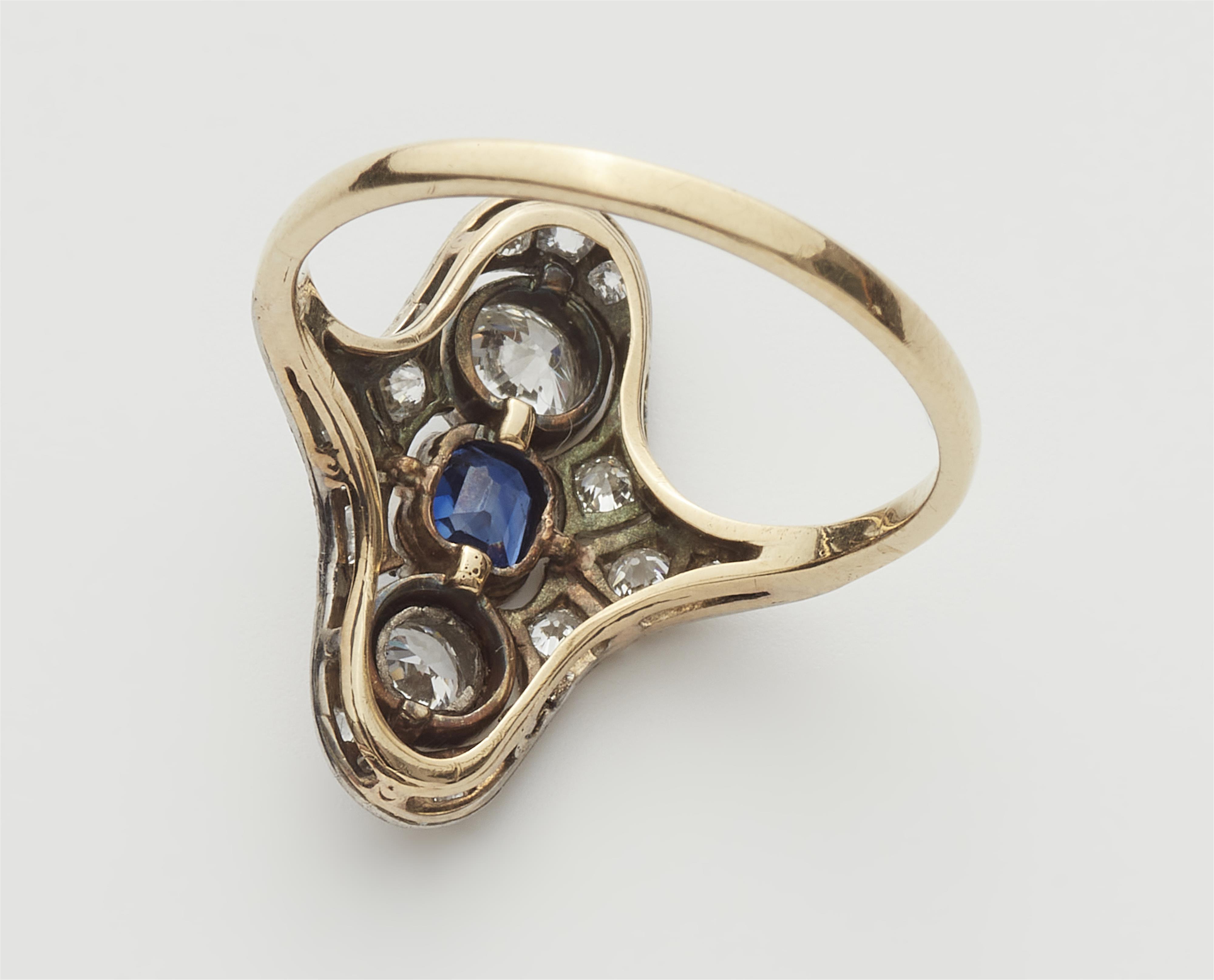 A 14k gold platinum diamond and sapphire Art Déco marquise ring. - image-2