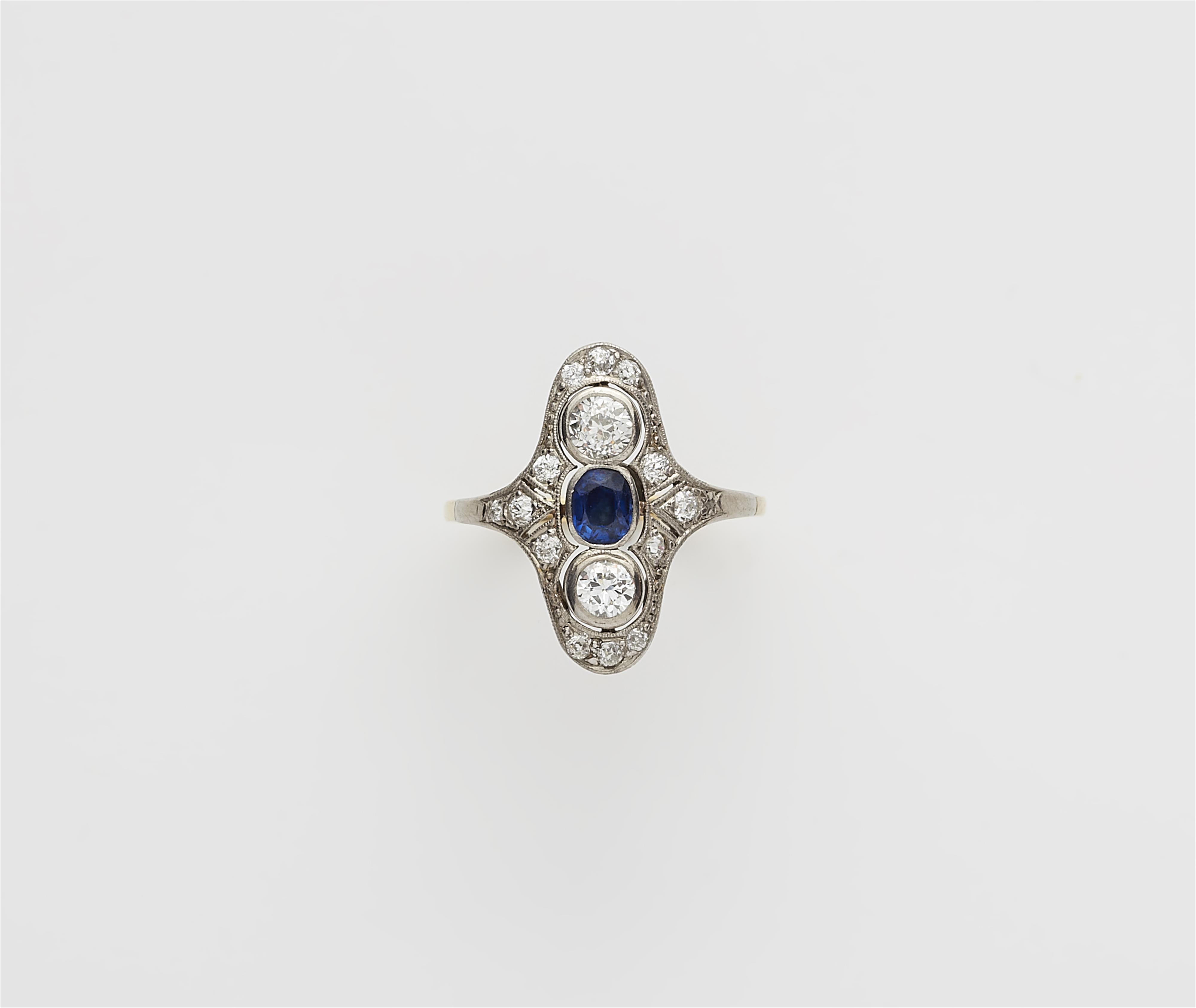 A 14k gold platinum diamond and sapphire Art Déco marquise ring. - image-1