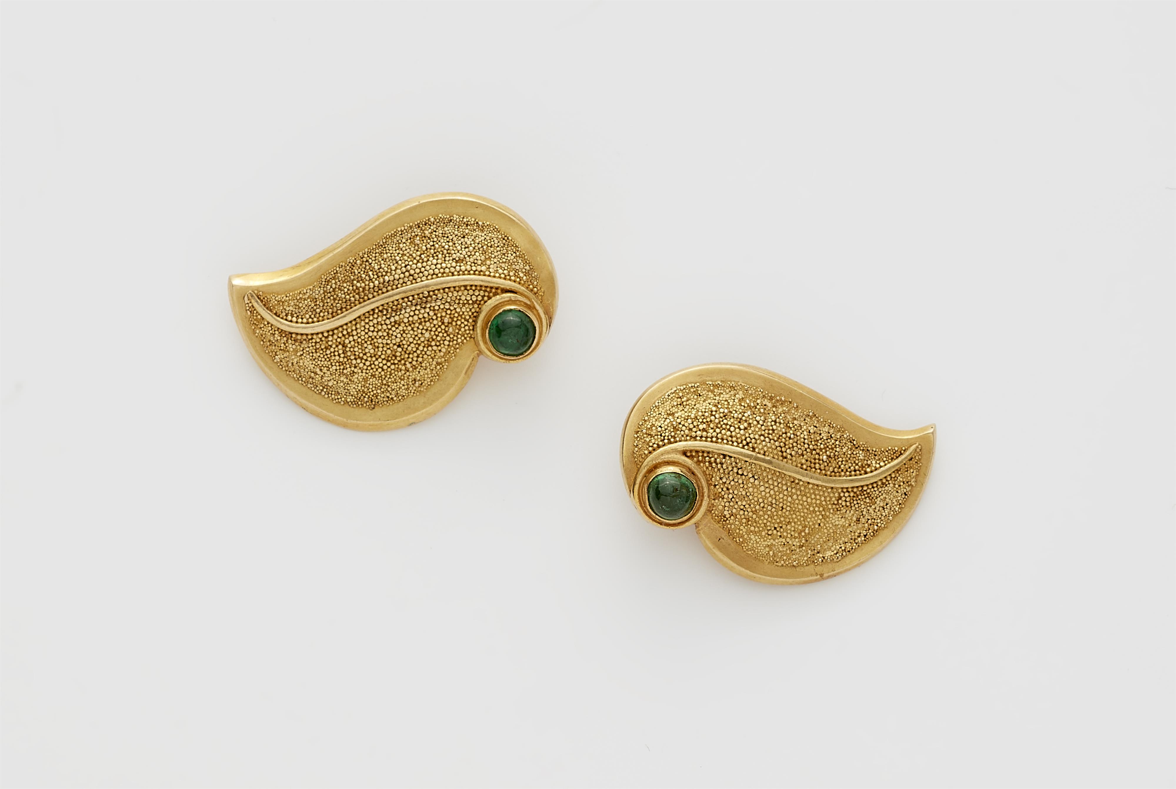 A pair of German 18k gold granulation and emerald cabochon clip earrings. - image-1