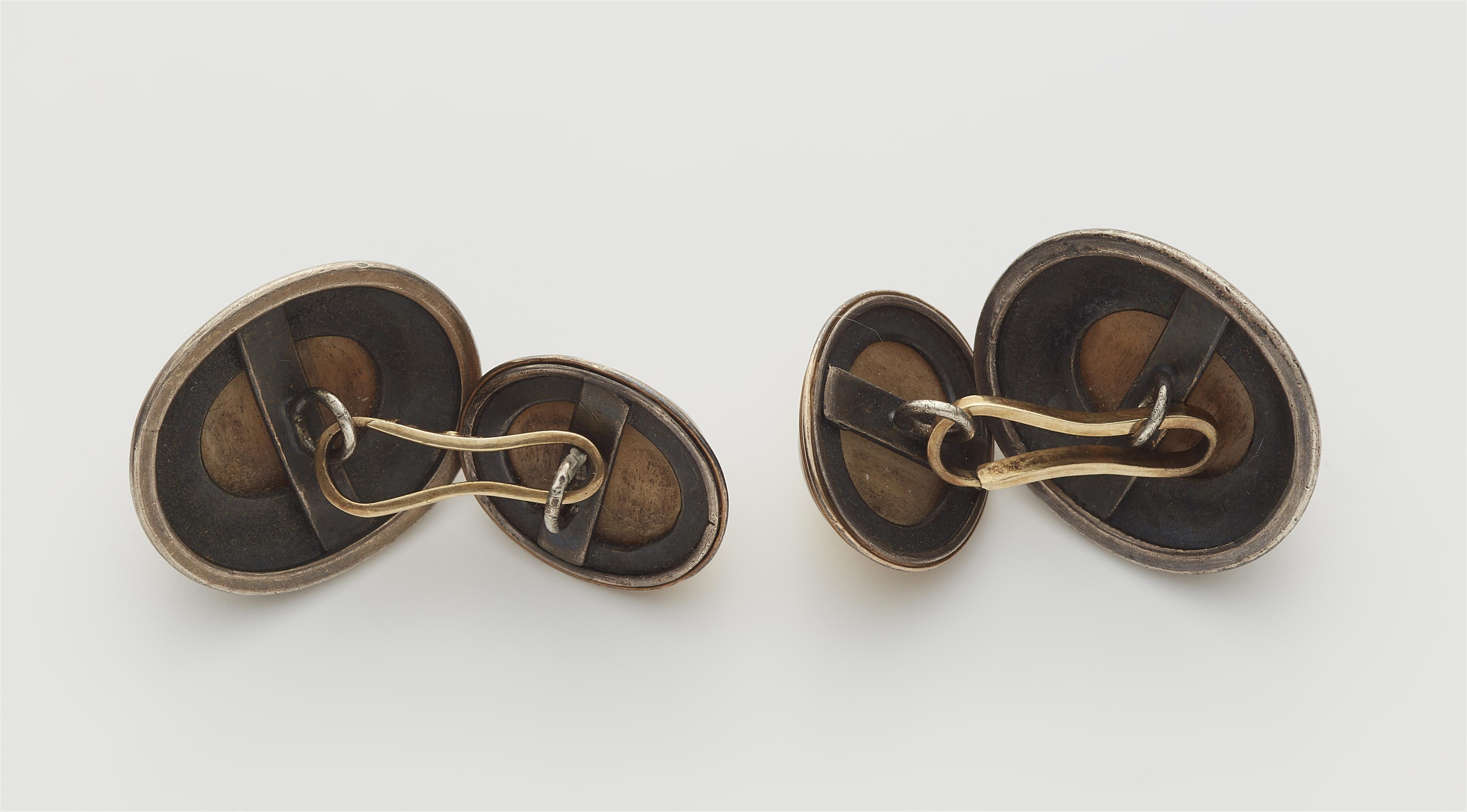 A pair of German oxydised silver 14k gold granulation and tiger's eye cufflinks. - image-2