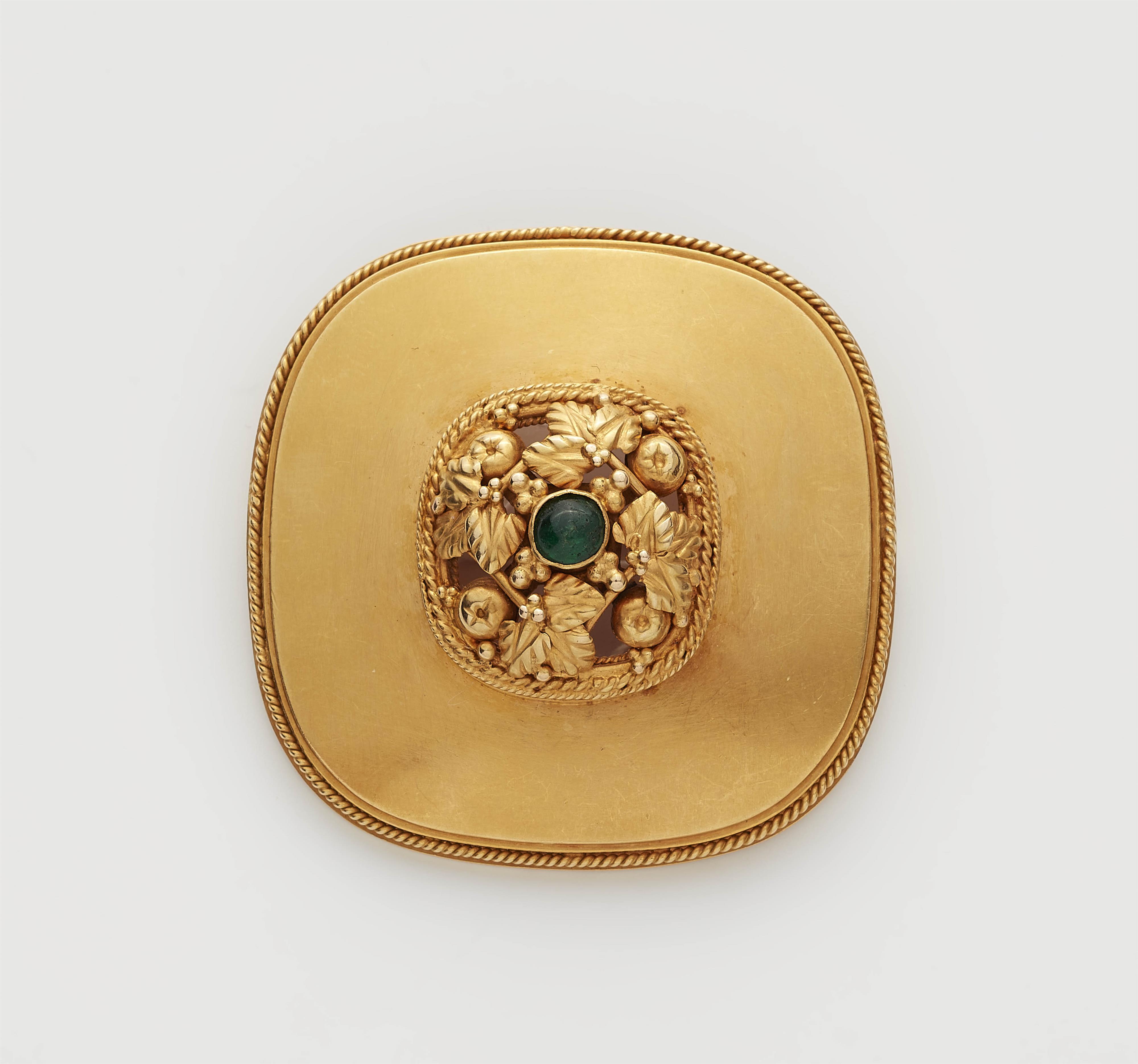 A German 18k gold emerald brooch. - image-1