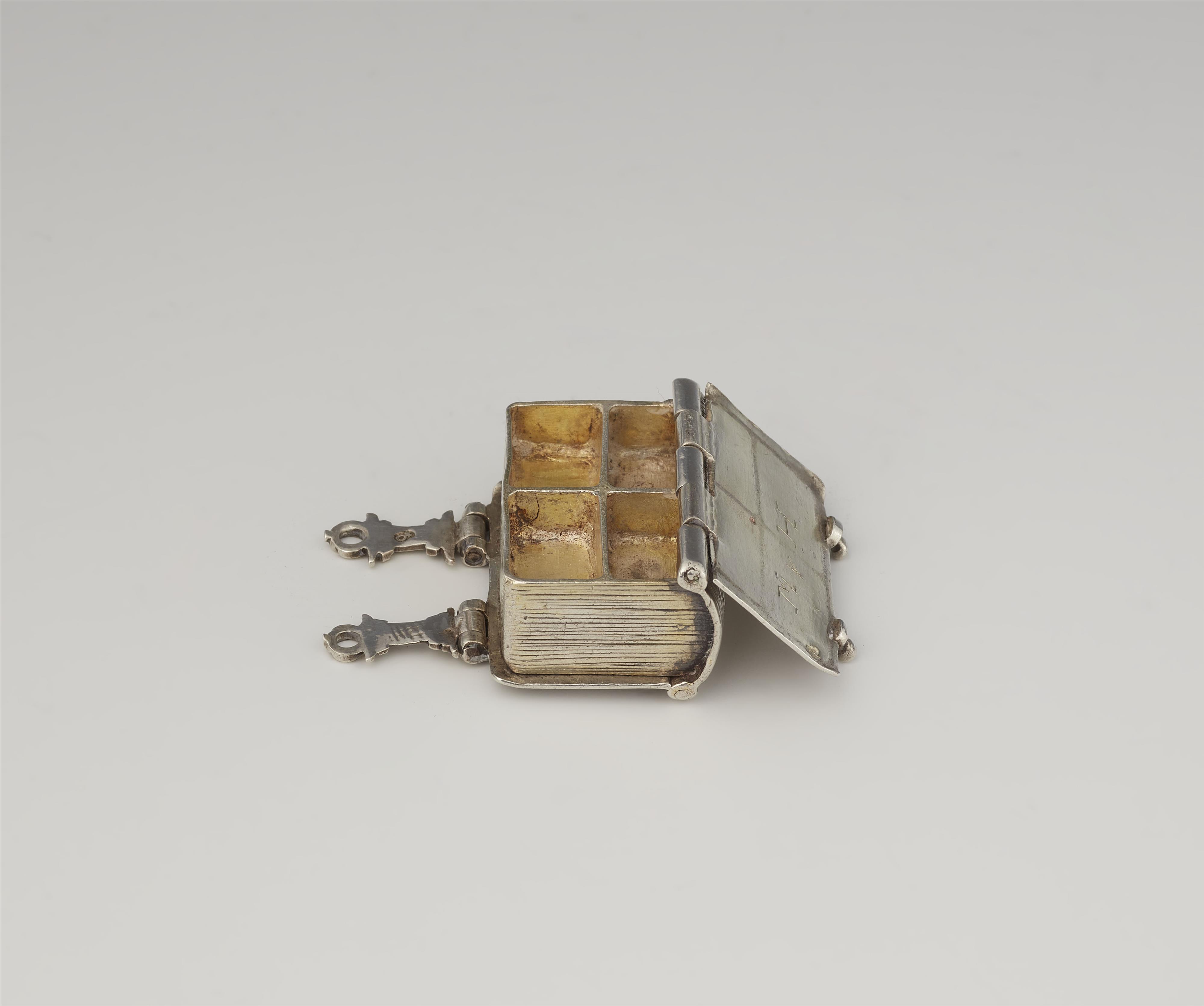 A silver pomander in the form of a book - image-2