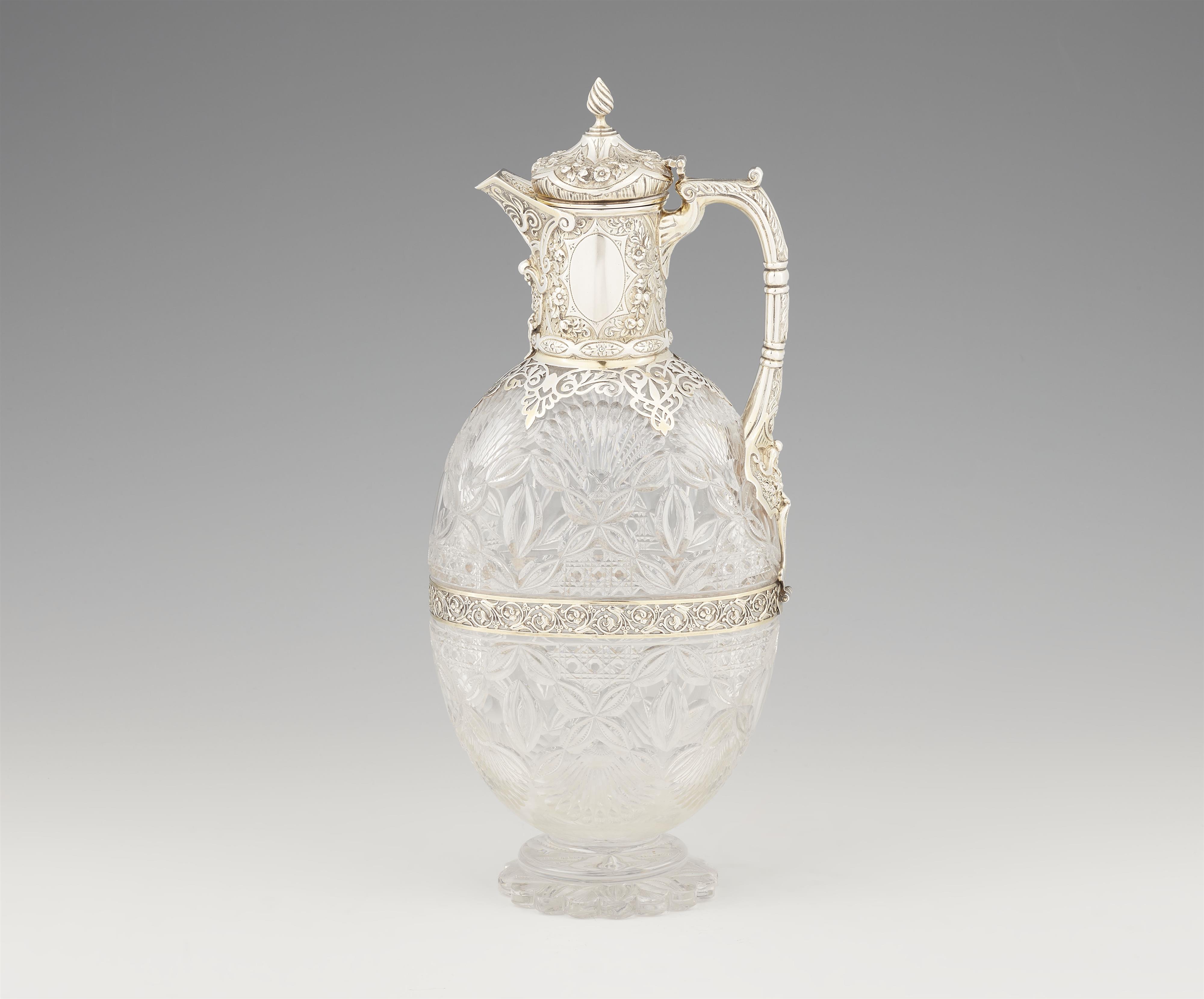 A Victorian parcel gilt silver claret jug - image-1