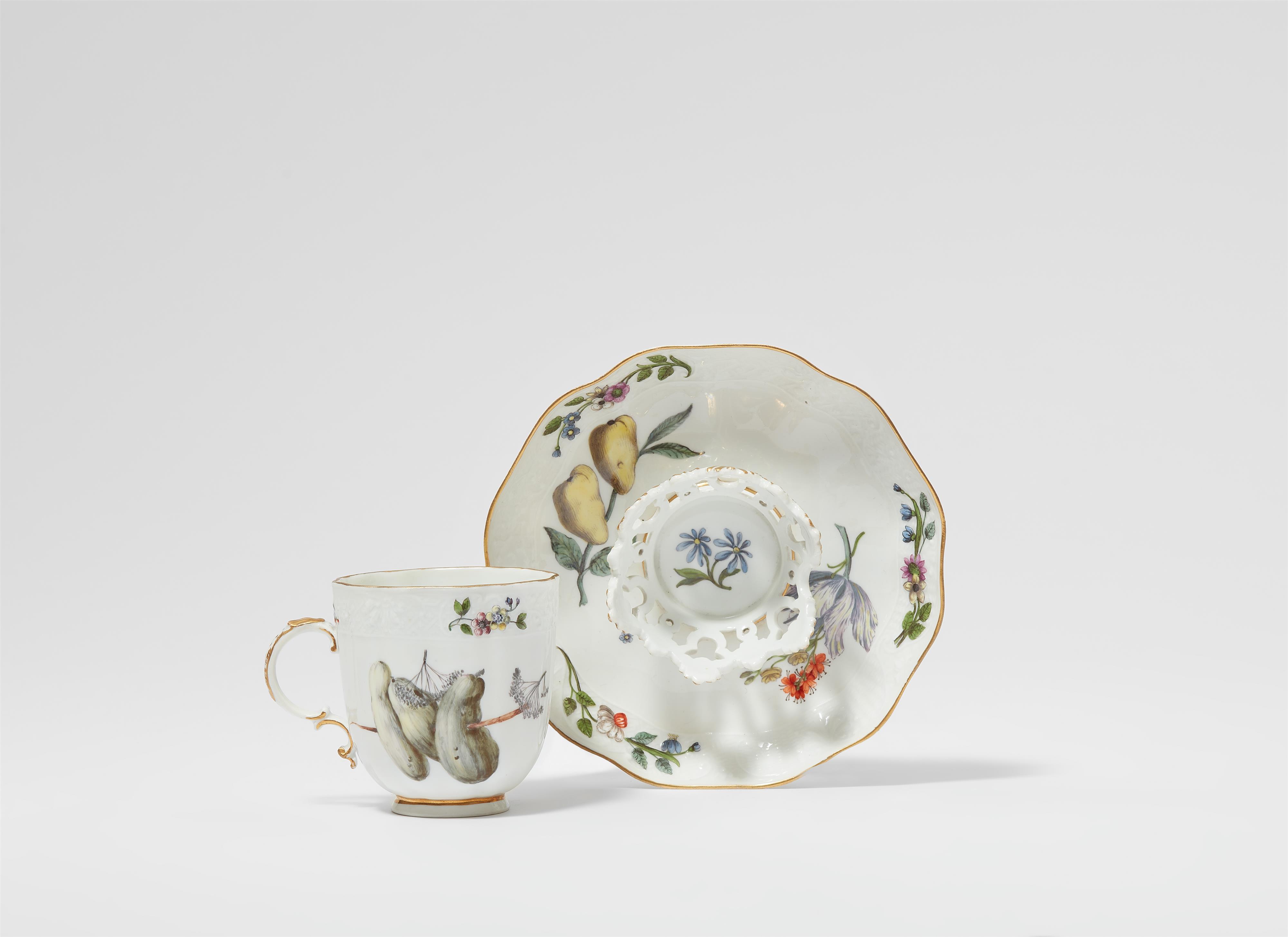 A Meissen porcelain trembleuse cup and saucer with flowers and fruit - image-1