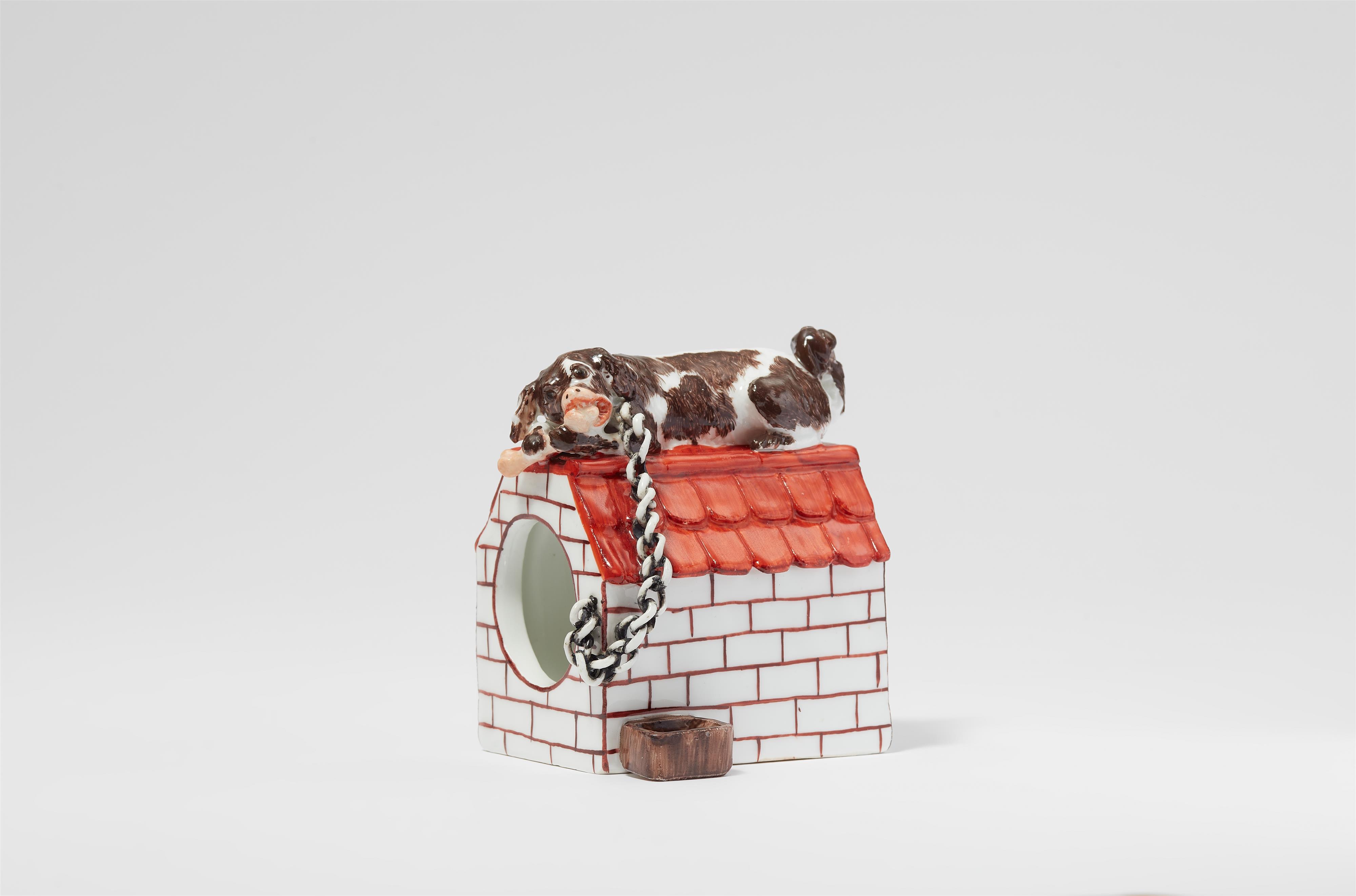 A rare and early Meissen porcelain dog on its kennel - image-1