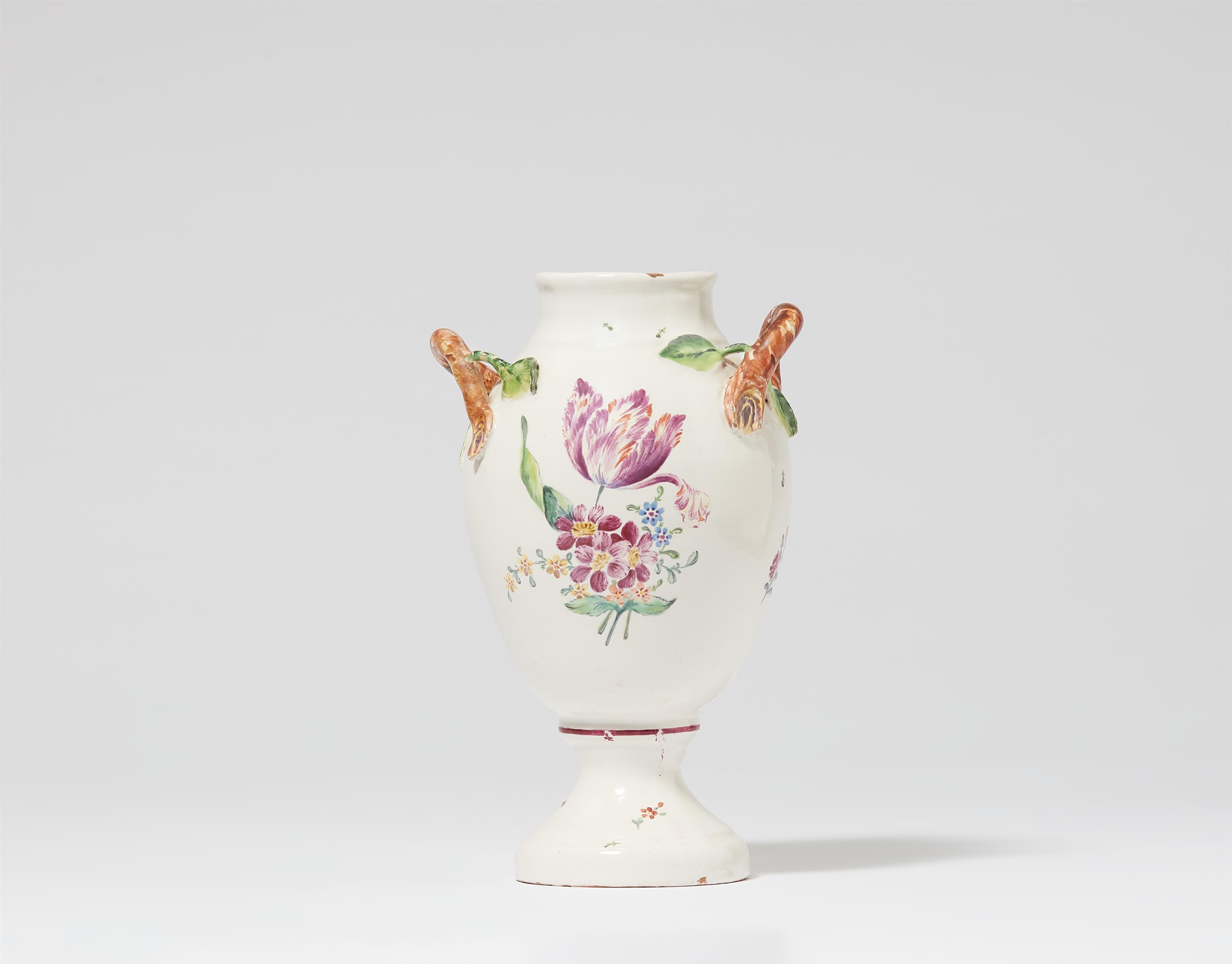 A Hubertusberg faience vase with branch handles - image-1