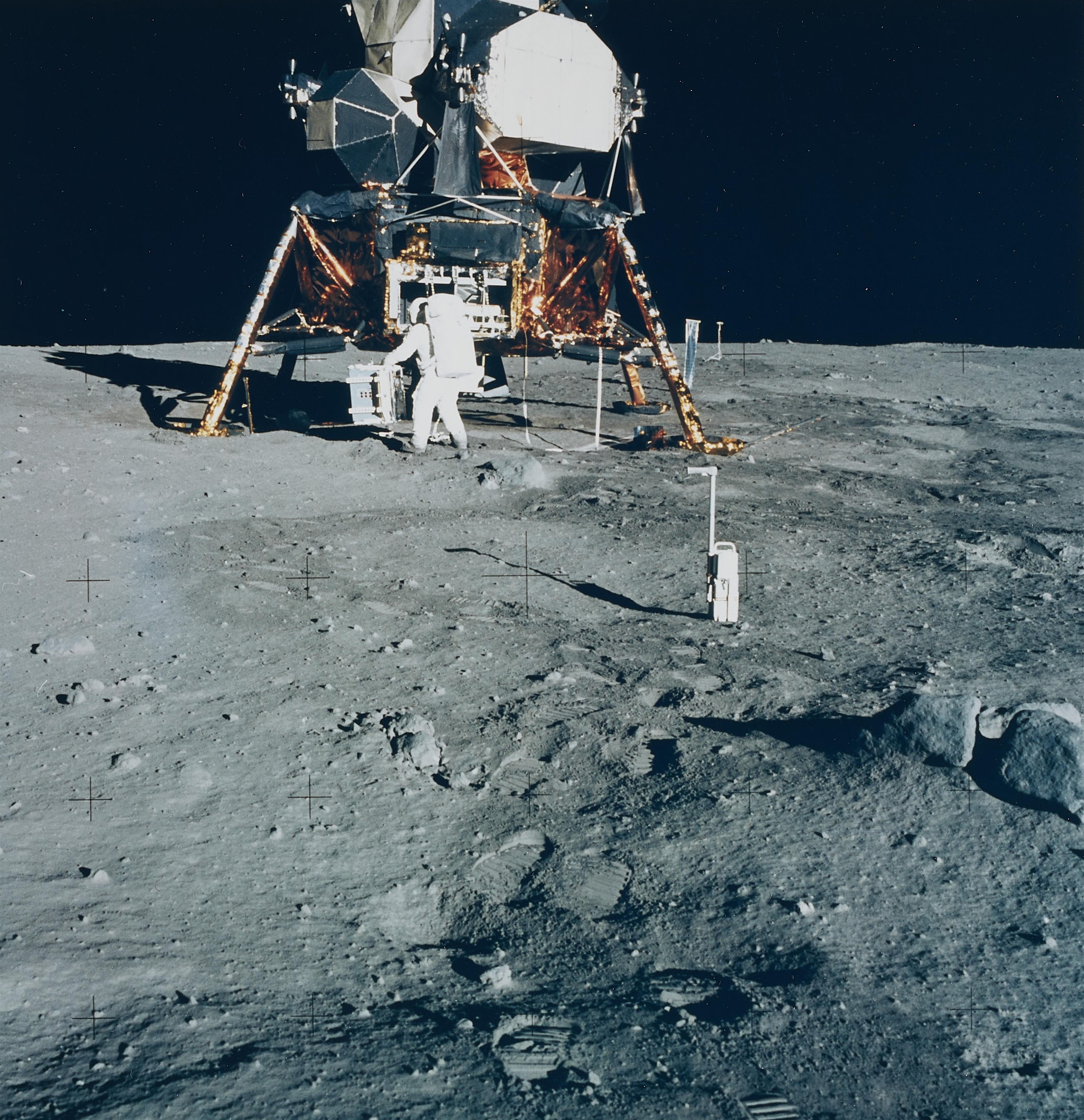 NASA - Astronaut Edwin E. Aldrin Jr. prepares to deploy the Early Apollo Scientific Experiments Package on the surface of the Moon, Apollo 11 - image-1