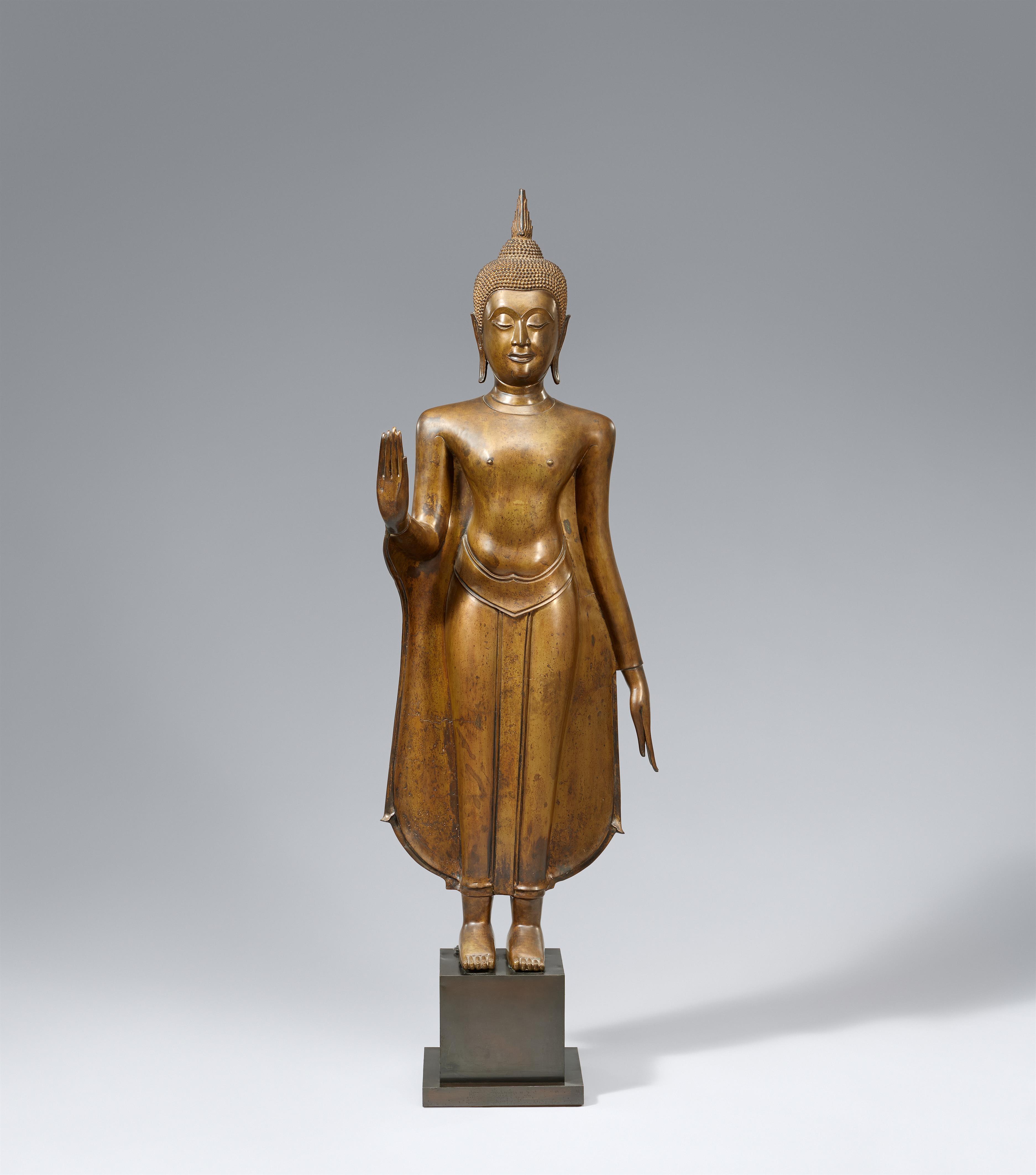 An Ayutthaya-style bronze figure of a standing Buddha. 19th/20th century - image-1