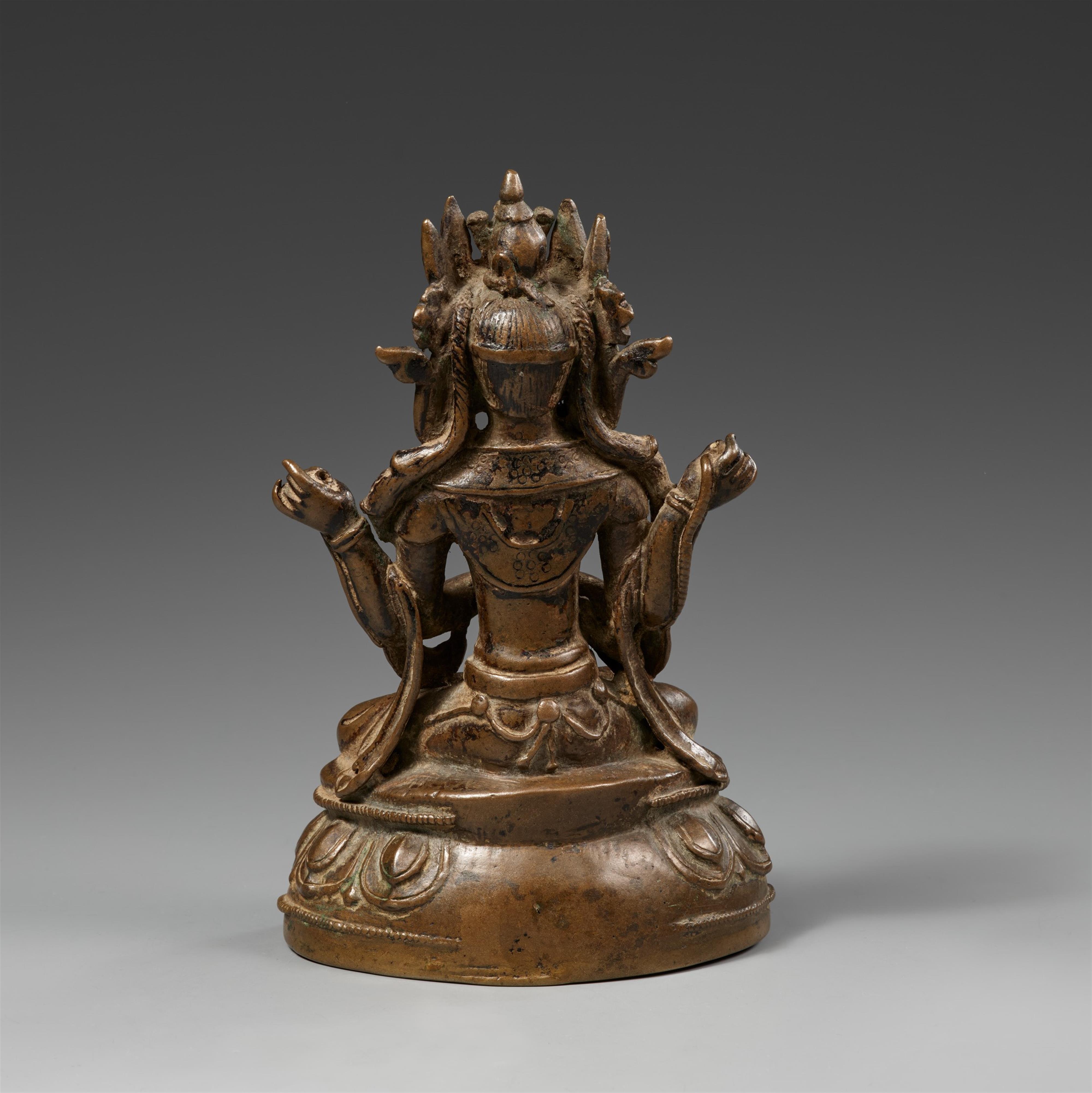A Tibetan yellowish bronze figure of Shadakshari Lokeshvara. 15th/16th century - image-2
