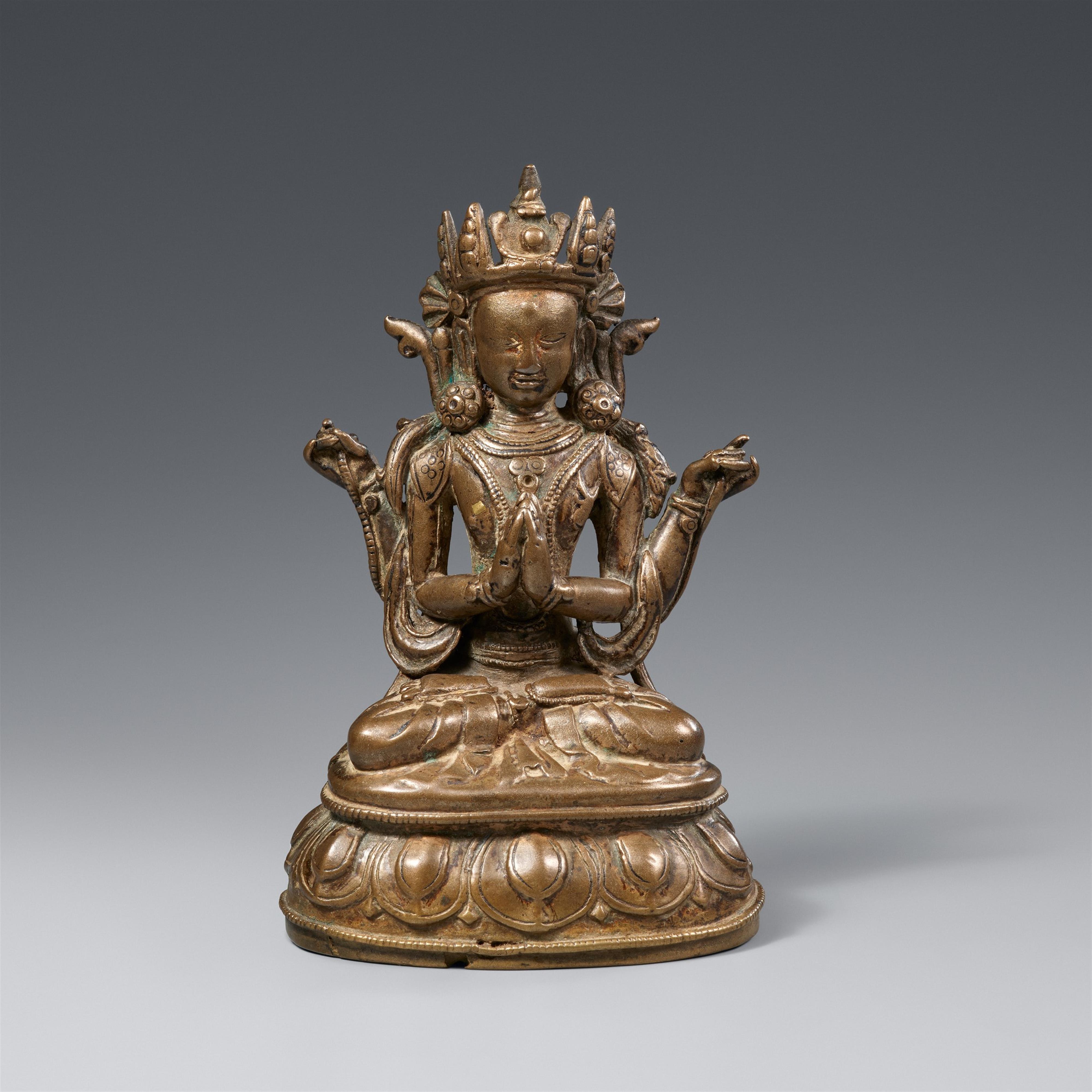 A Tibetan yellowish bronze figure of Shadakshari Lokeshvara. 15th/16th century - image-1