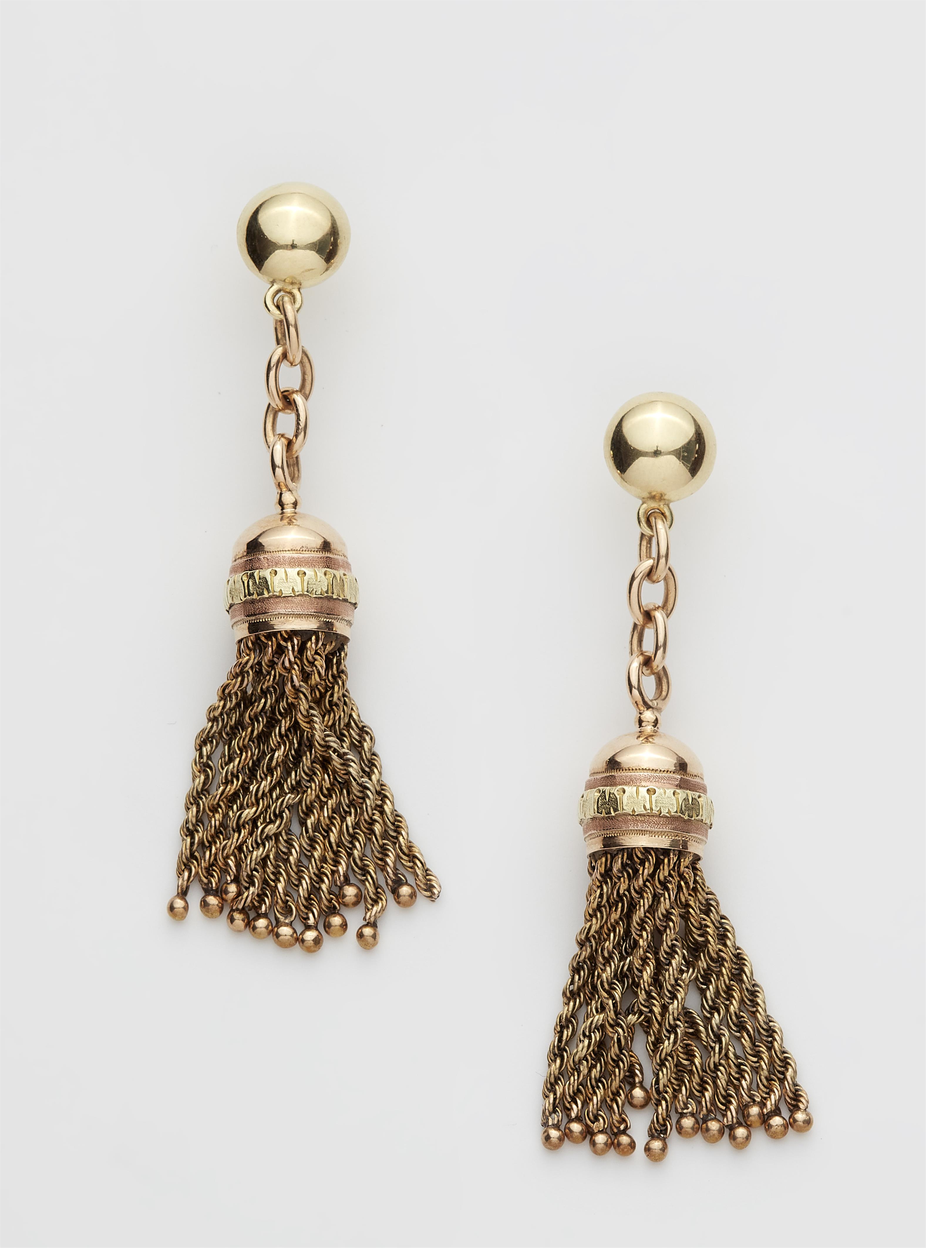 A pair of bicolour 14k gold tassel stud earrings. - image-1