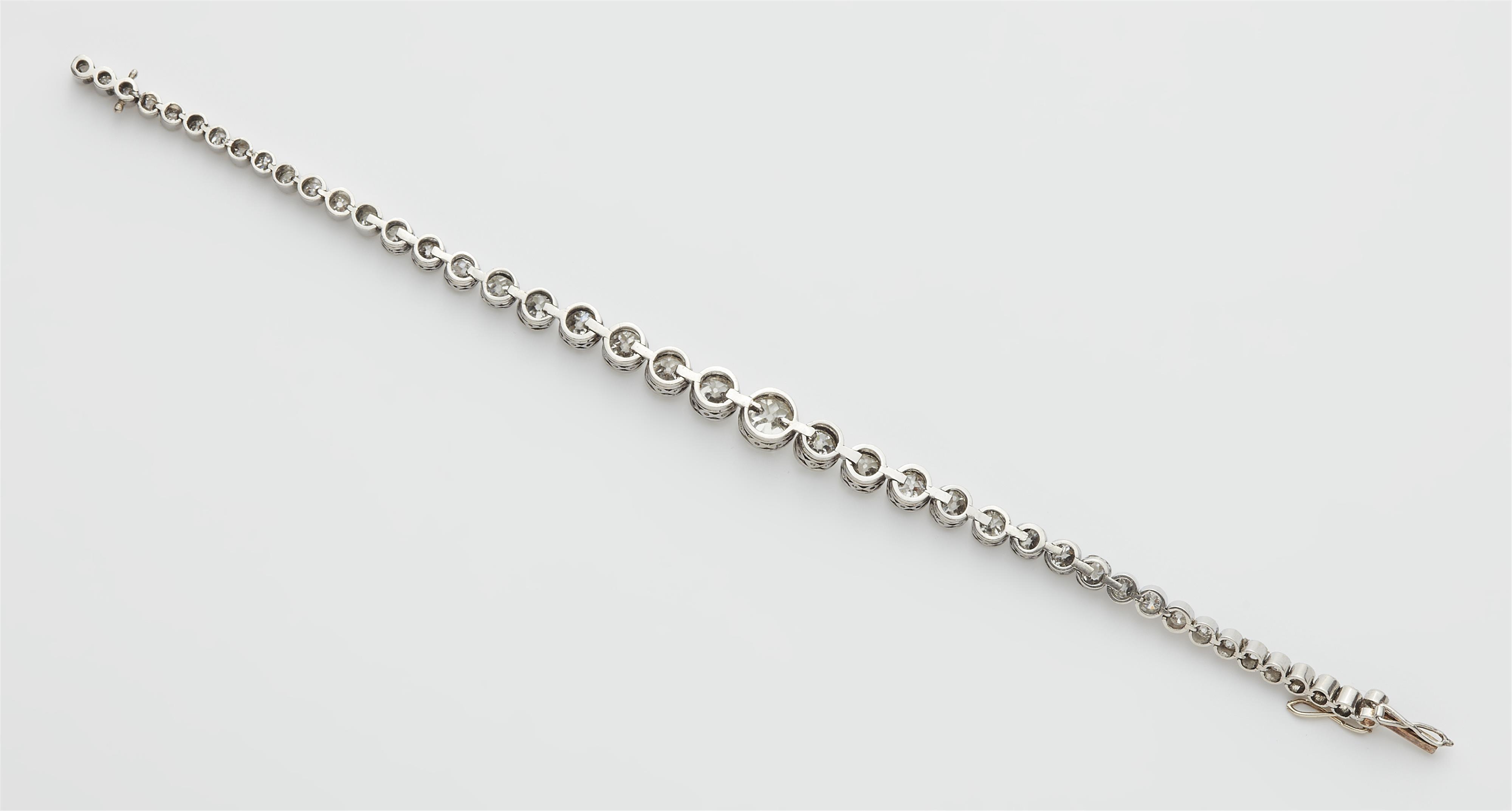 A Belle Epoque platinum and diamond tennis bracelet. - image-2