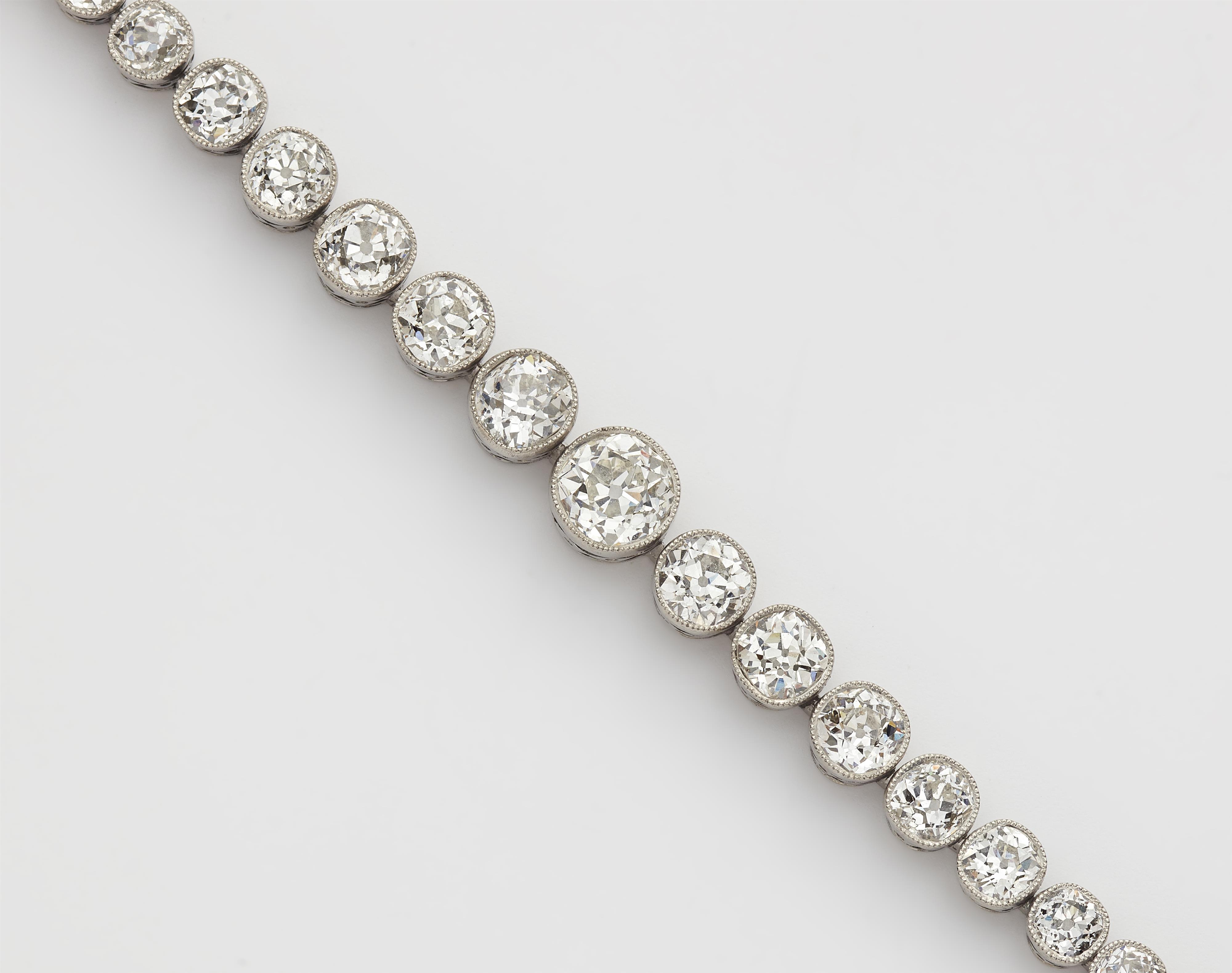 A Belle Epoque platinum and diamond tennis bracelet. - image-4