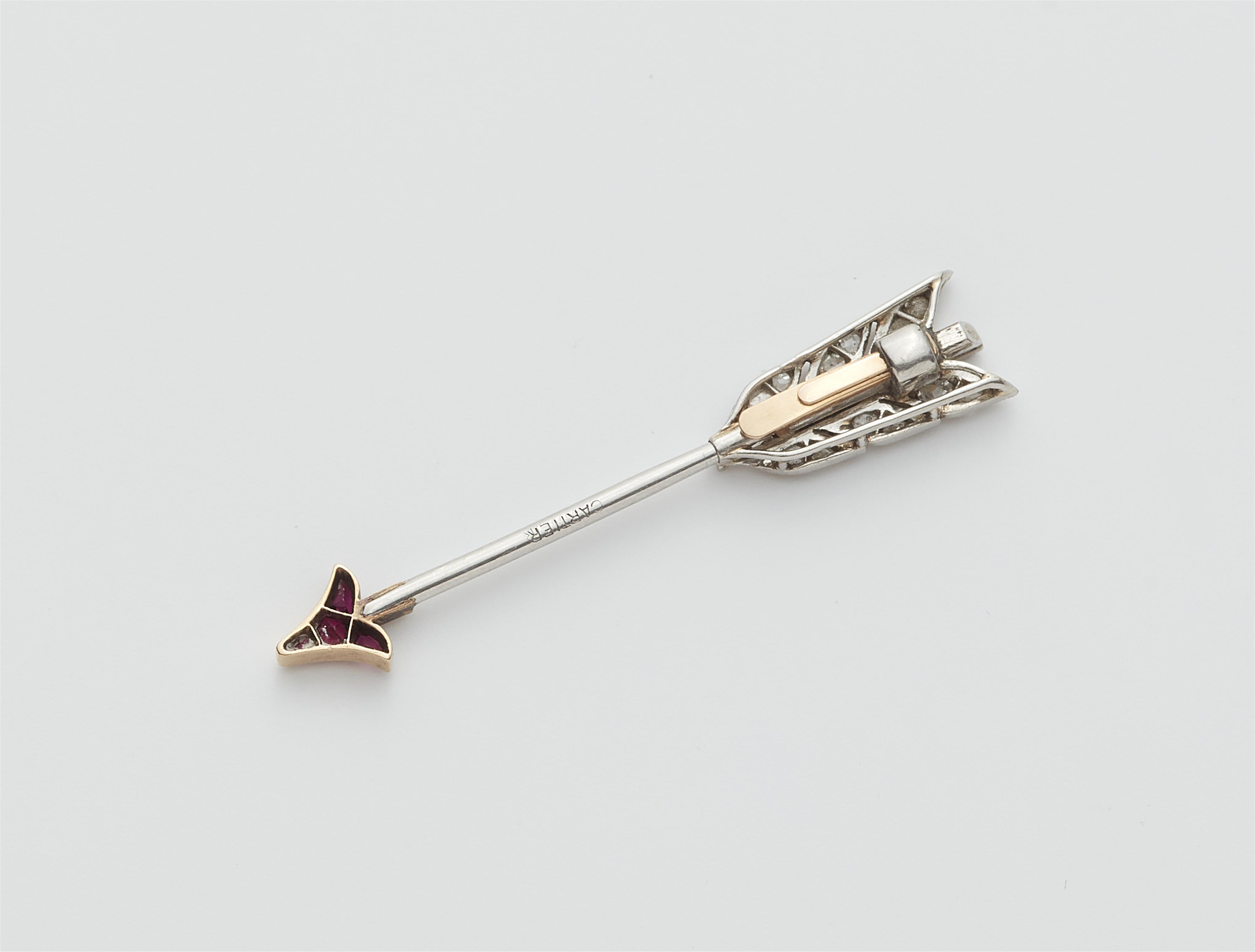 A French platinum ruby and diamond arrow jabot pin. - image-2