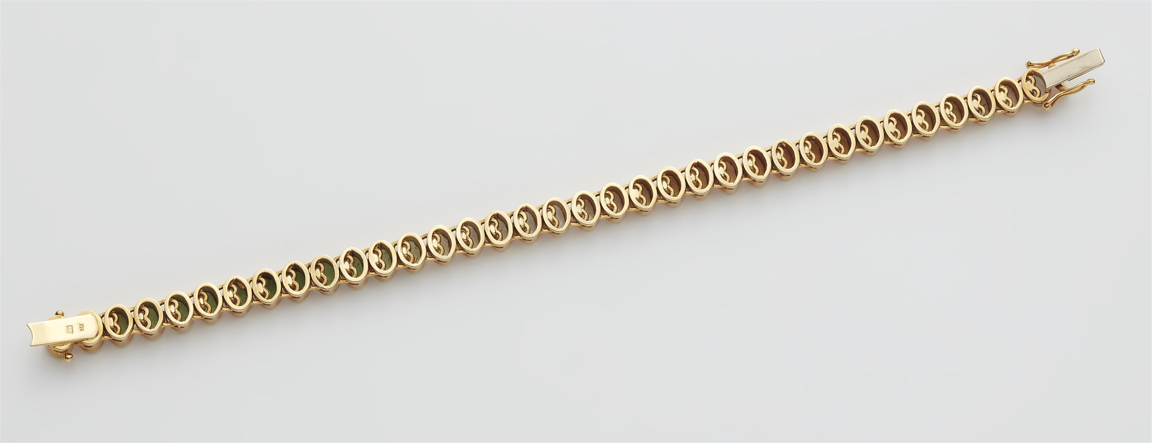 A German 18k gold and coloured grossular bracelet. - image-2