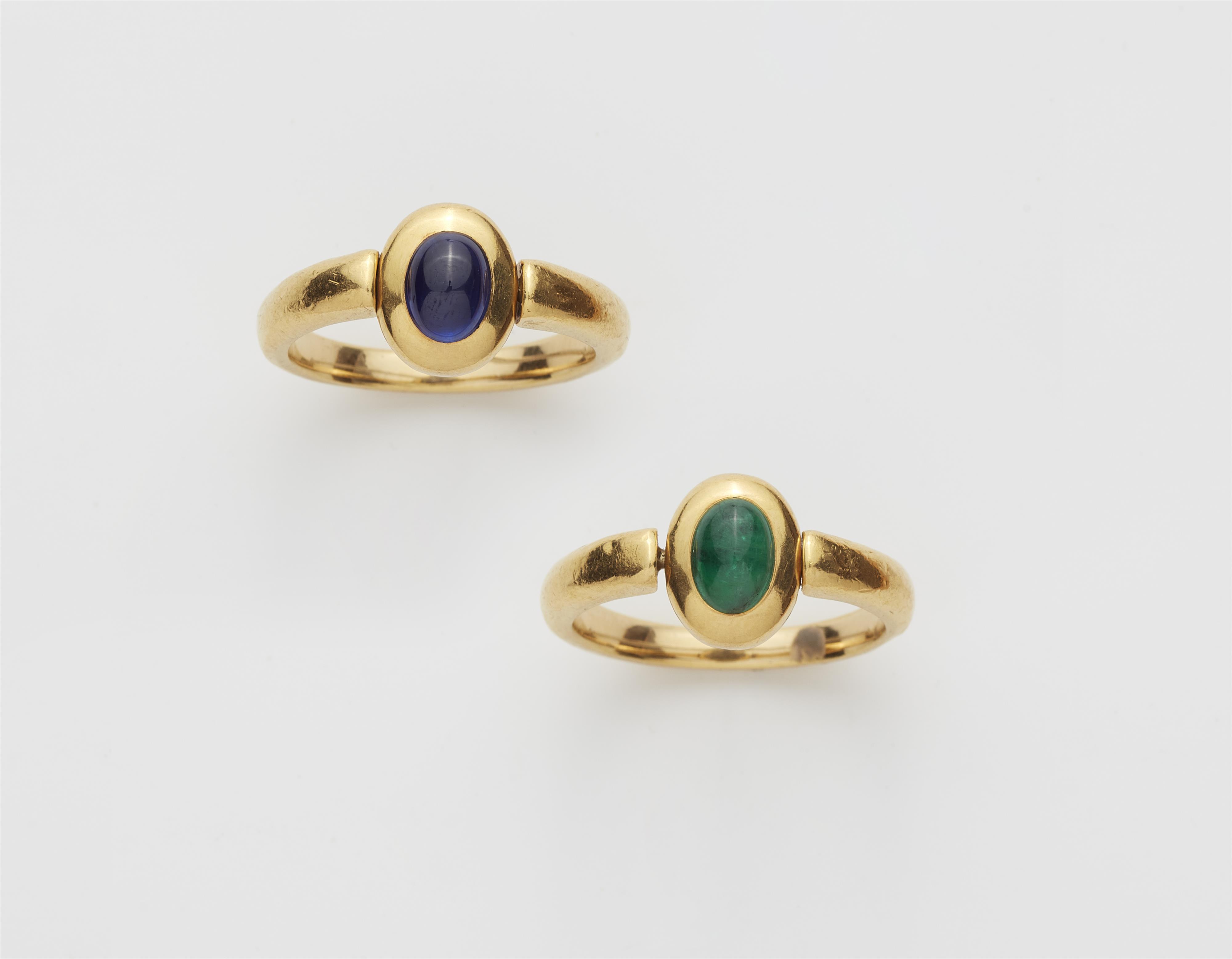 A pair of German 18/21k gold and coloured gemstone cabochon rings. - image-1