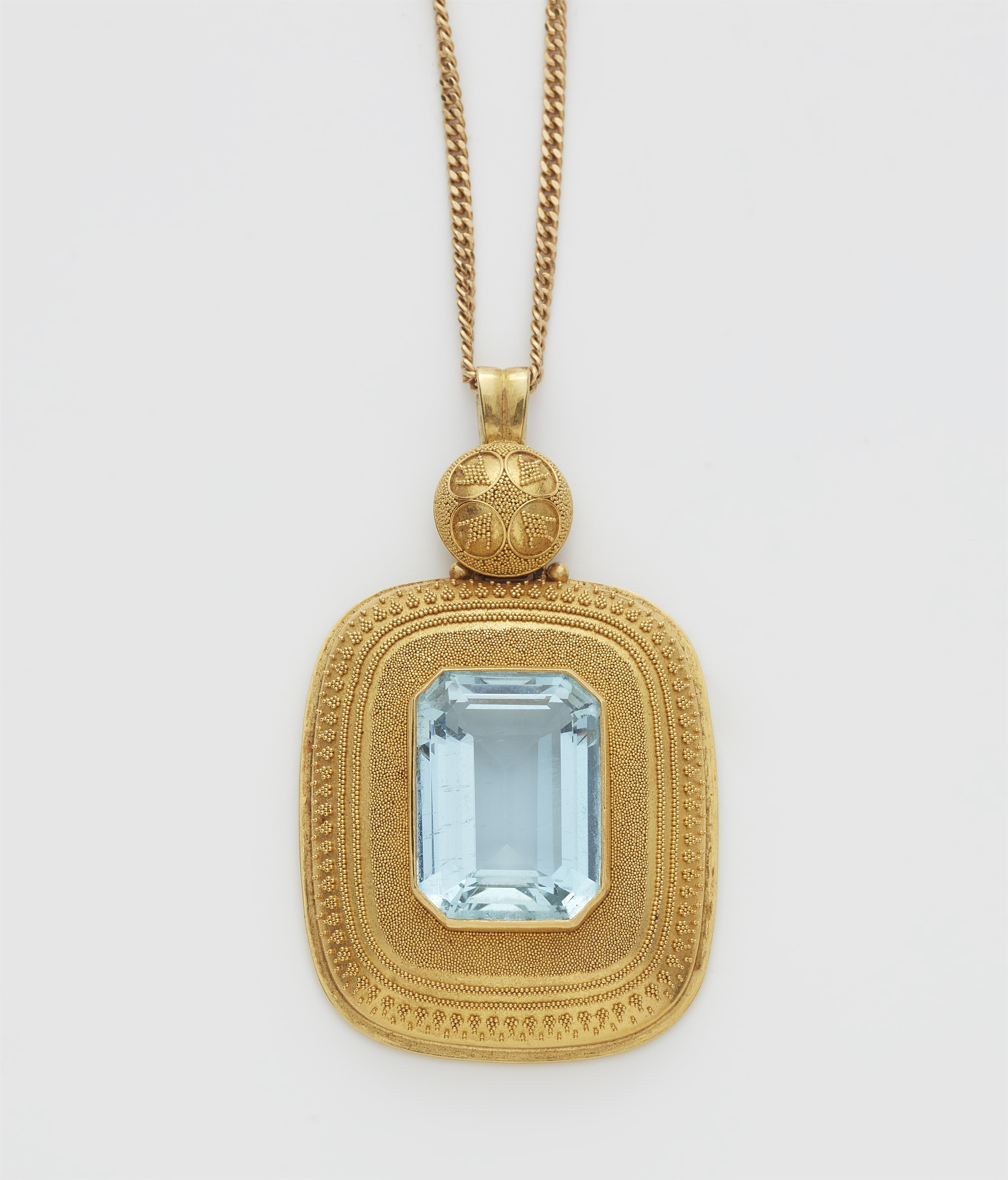 A German 18k gold granulation and emerald-cut aquamarine pendant with attached chain. - image-1