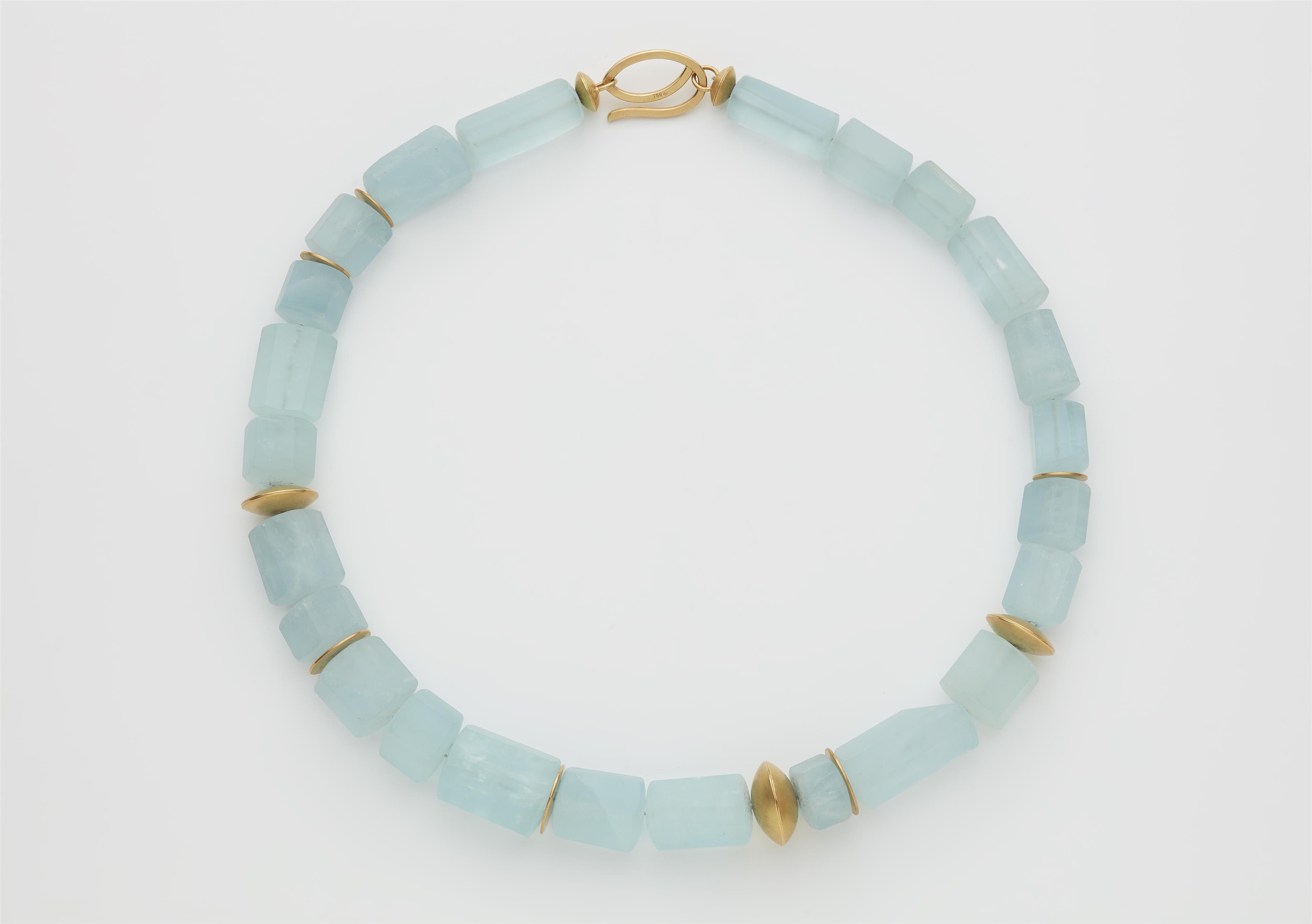 A German 18k gold and facetted cylindrical aquamarine necklace. - image-1