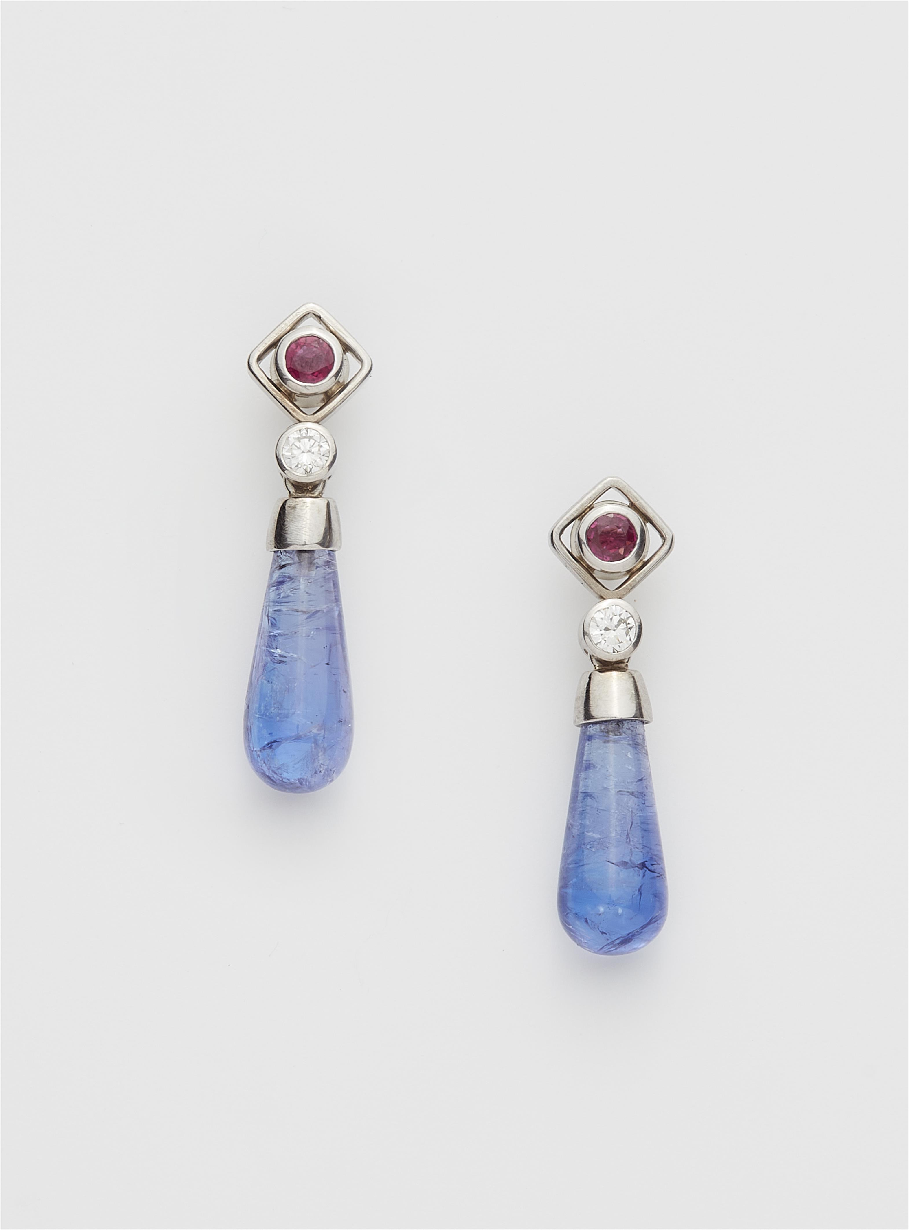 A pair of German 14k white gold diamond ruby and tanzanite pampile stud earrings. - image-1