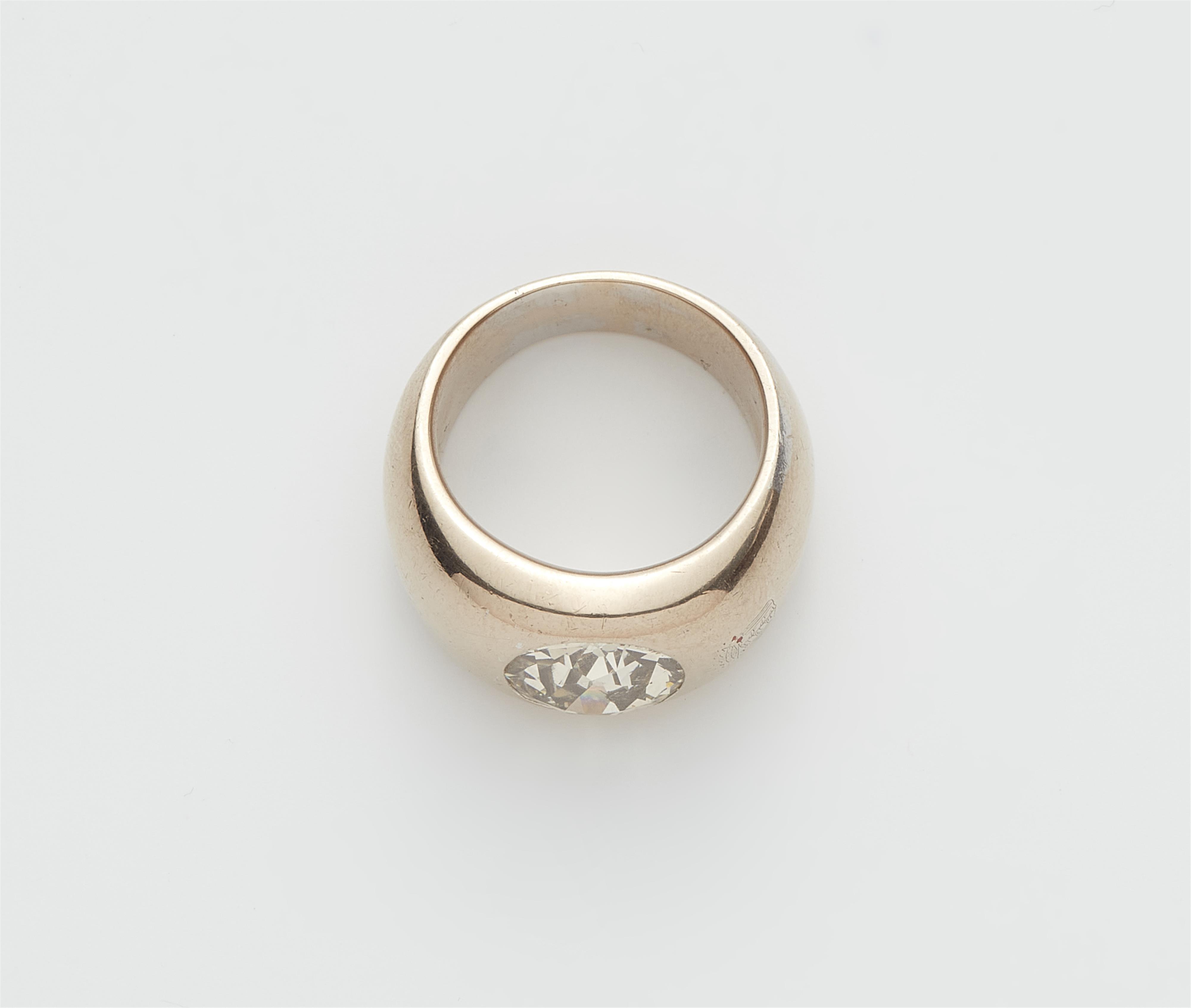 An 18k gold and brownish European old-cut diamond solitaire ring. - image-3