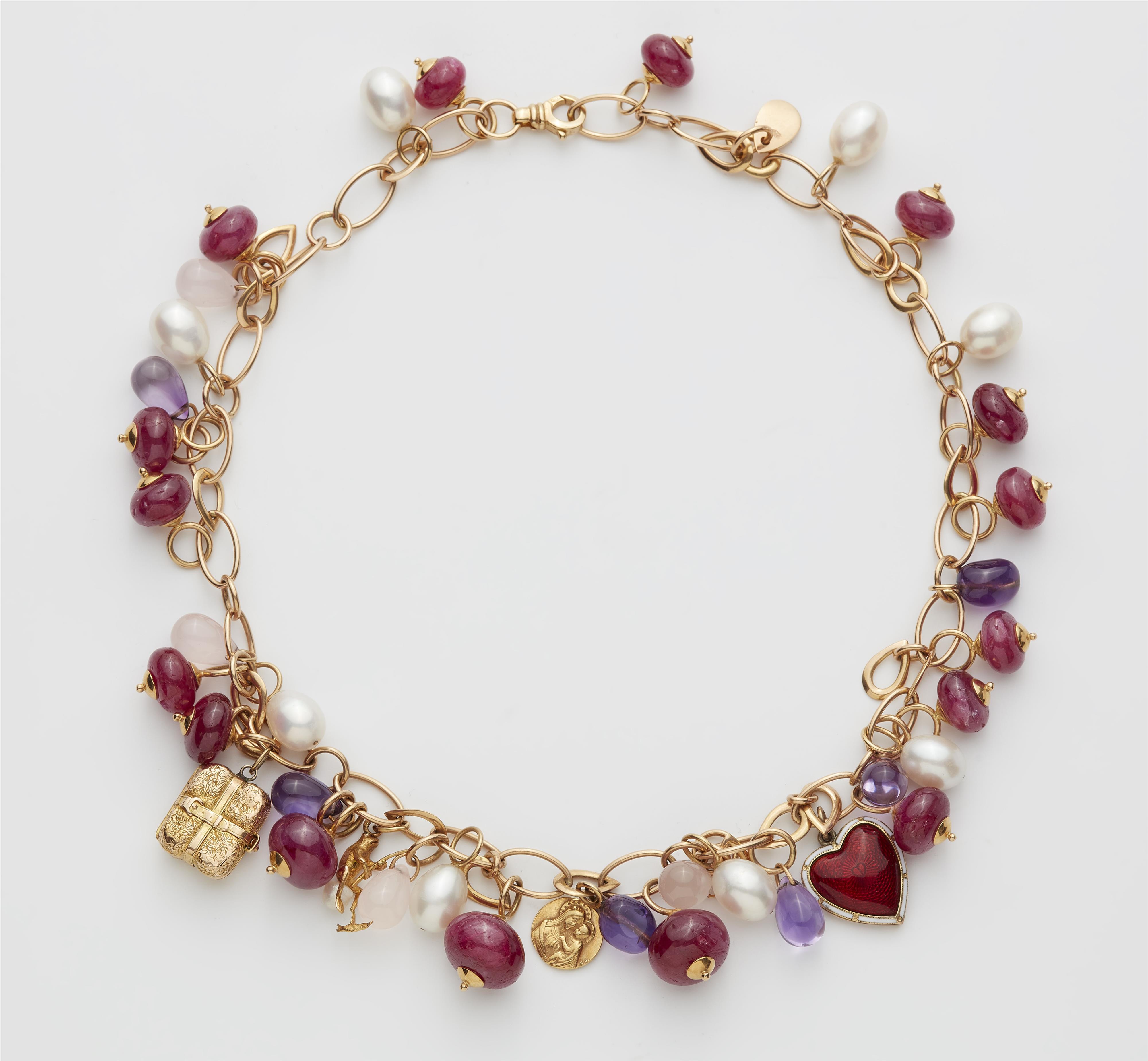 An Italian 18k rose gold ruby amethyst rose quartz and cultured pearl charm necklace. - image-1