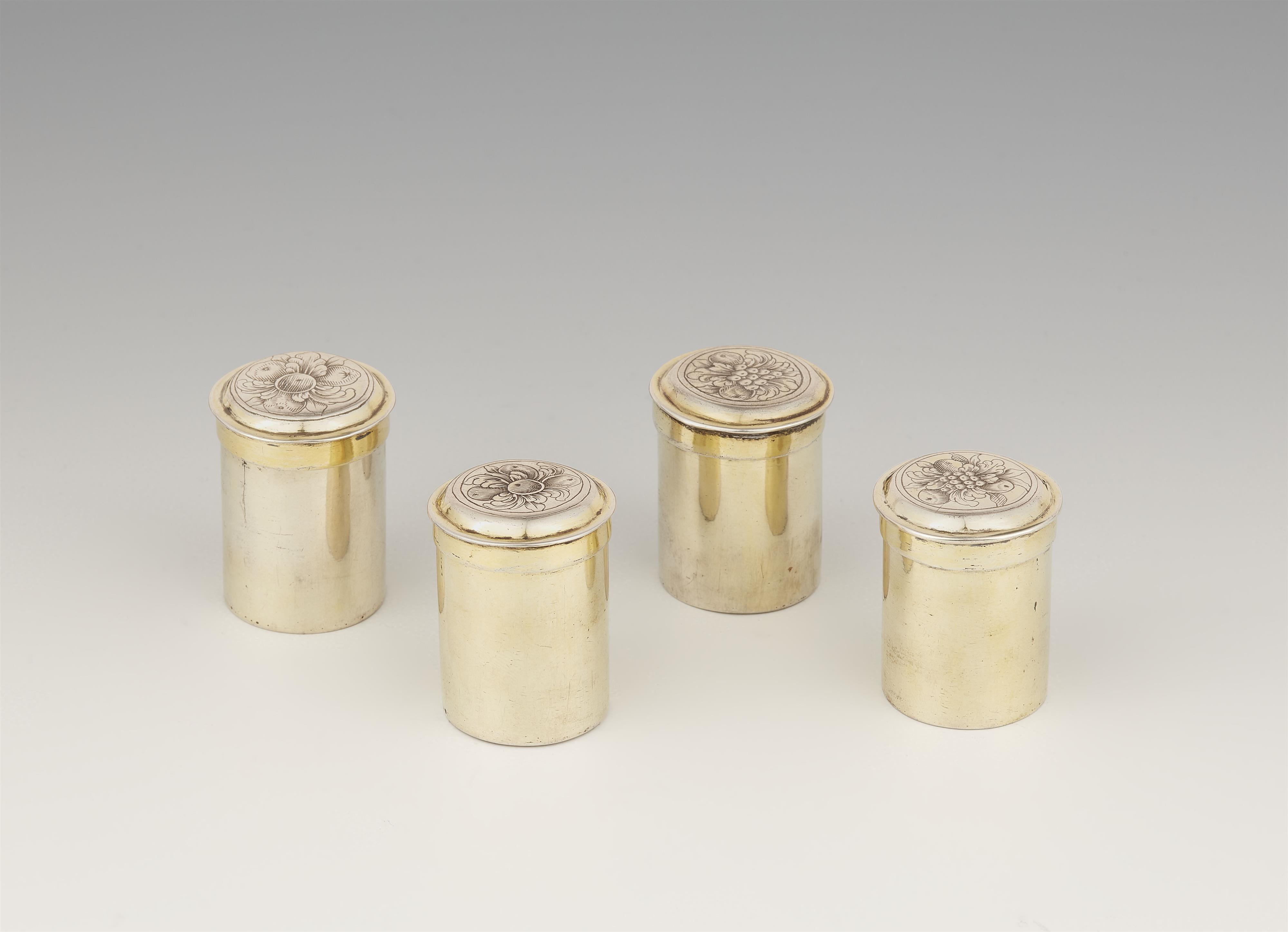 Four Augsburg parcel gilt silver boxes from a travel necessaire - image-1