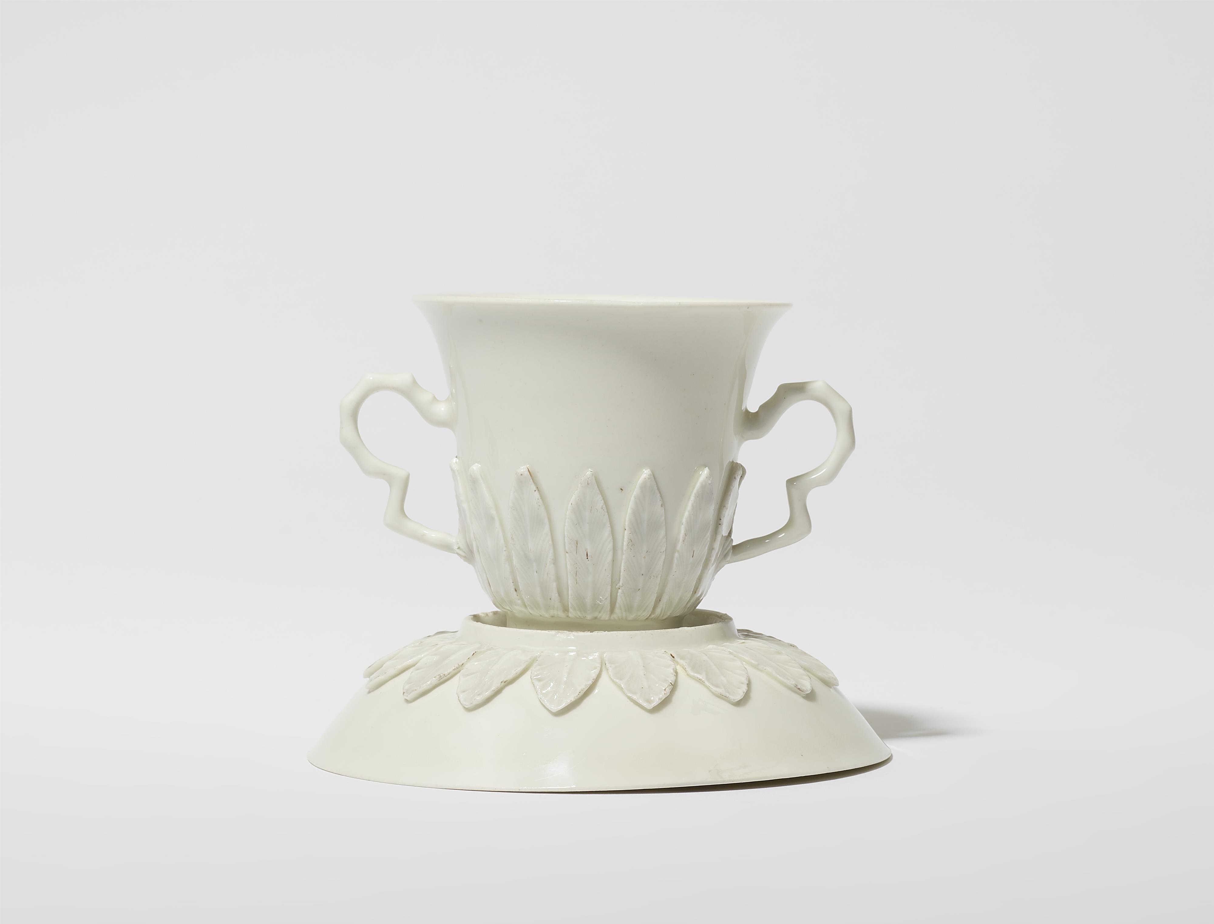 A Meissen Böttger porcelain beaker and saucer with laurel relief decor - image-1