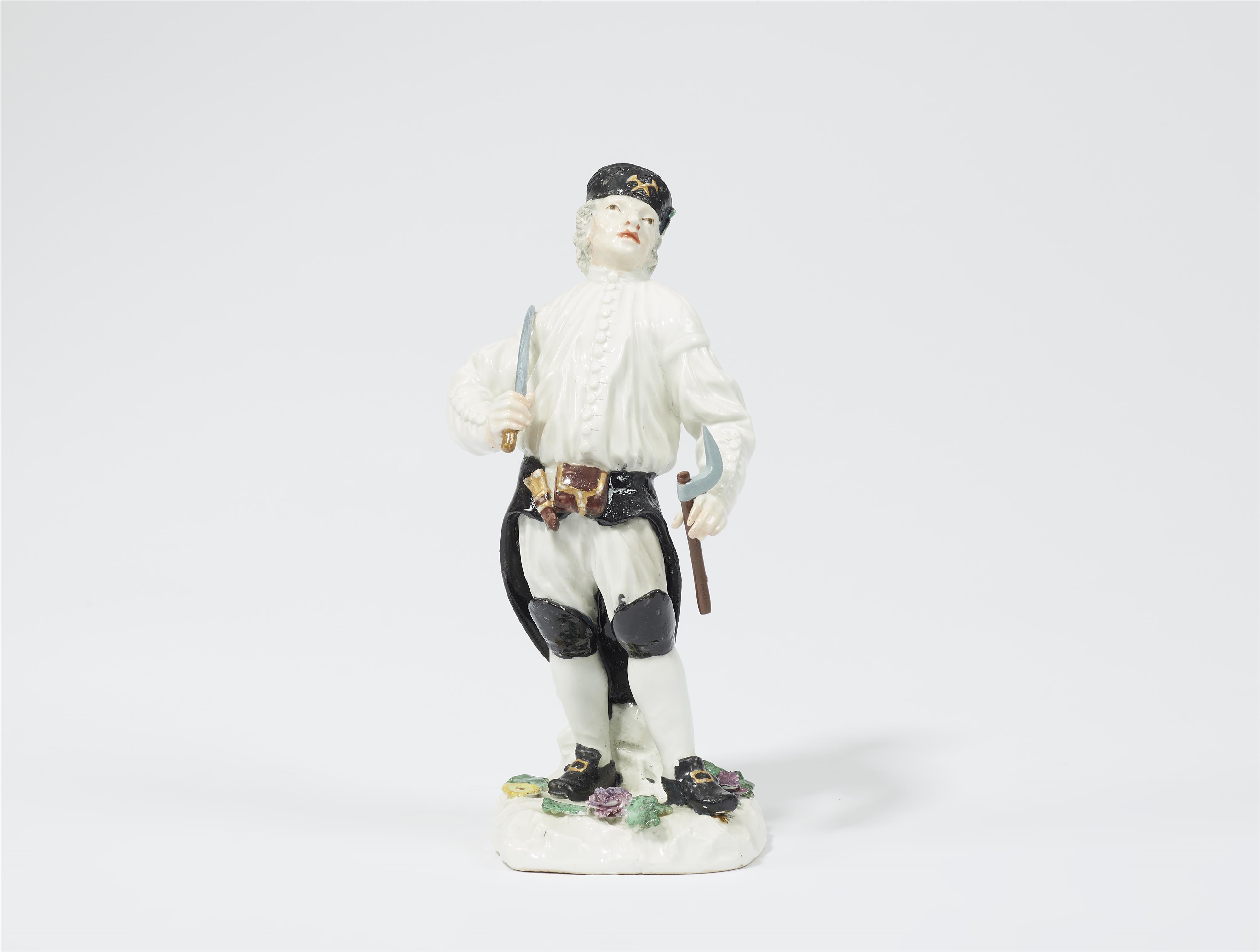 A Meissen porcelain figure of a miner / hewer - image-1