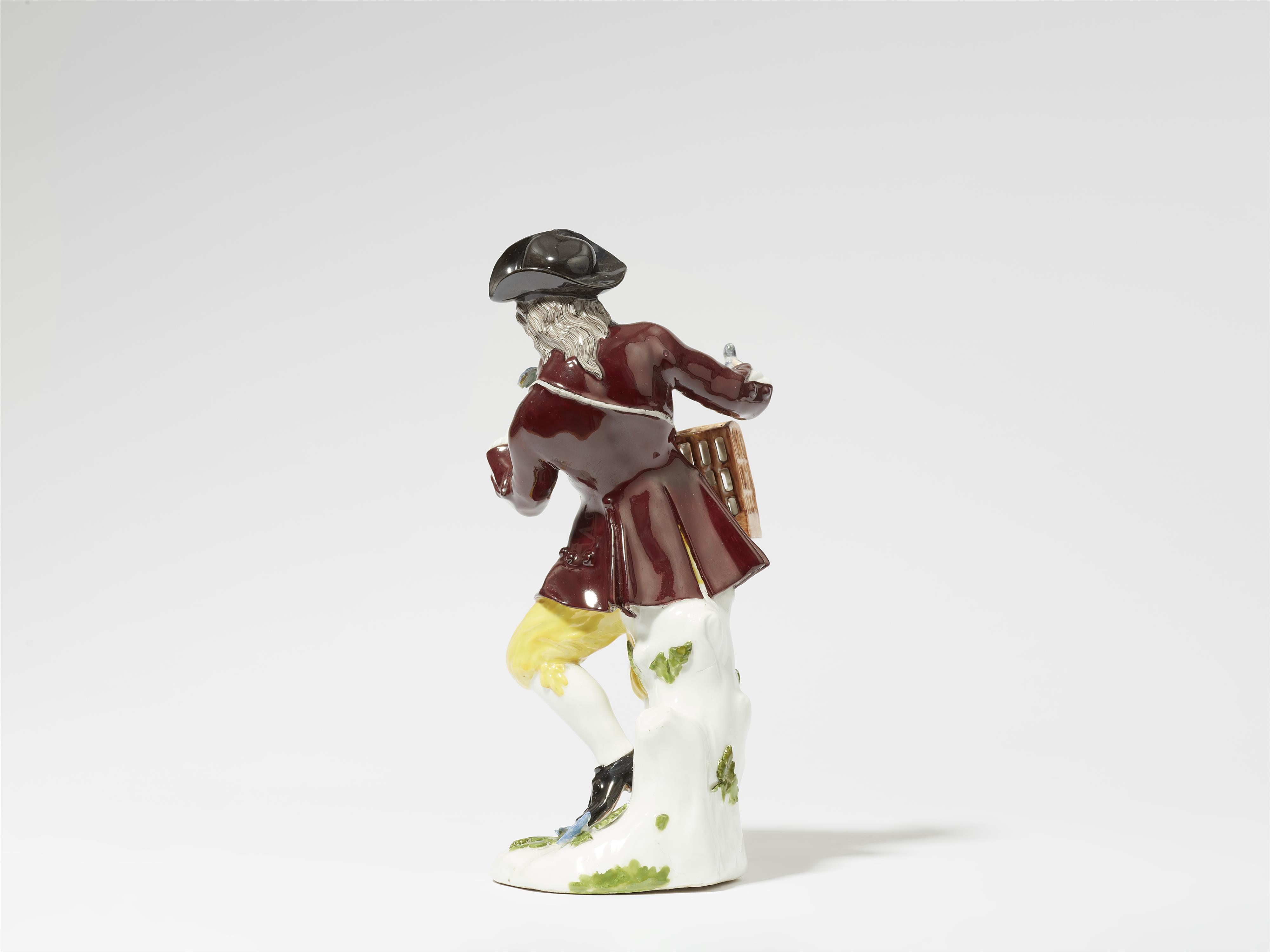 A Meissen porcelain figure of a bird seller - image-3