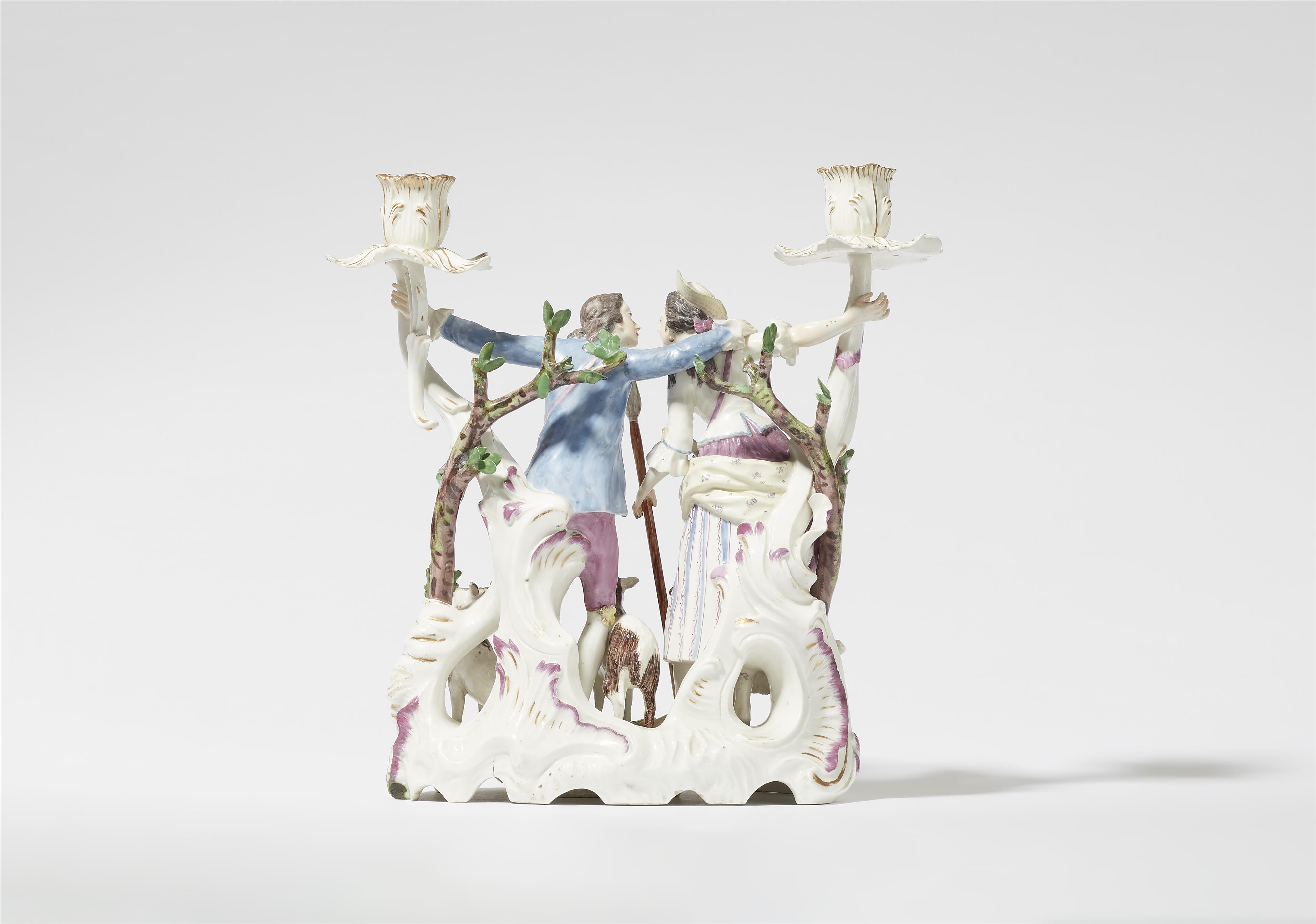 A Höchst porcelain candlestick with kissing figures - image-3