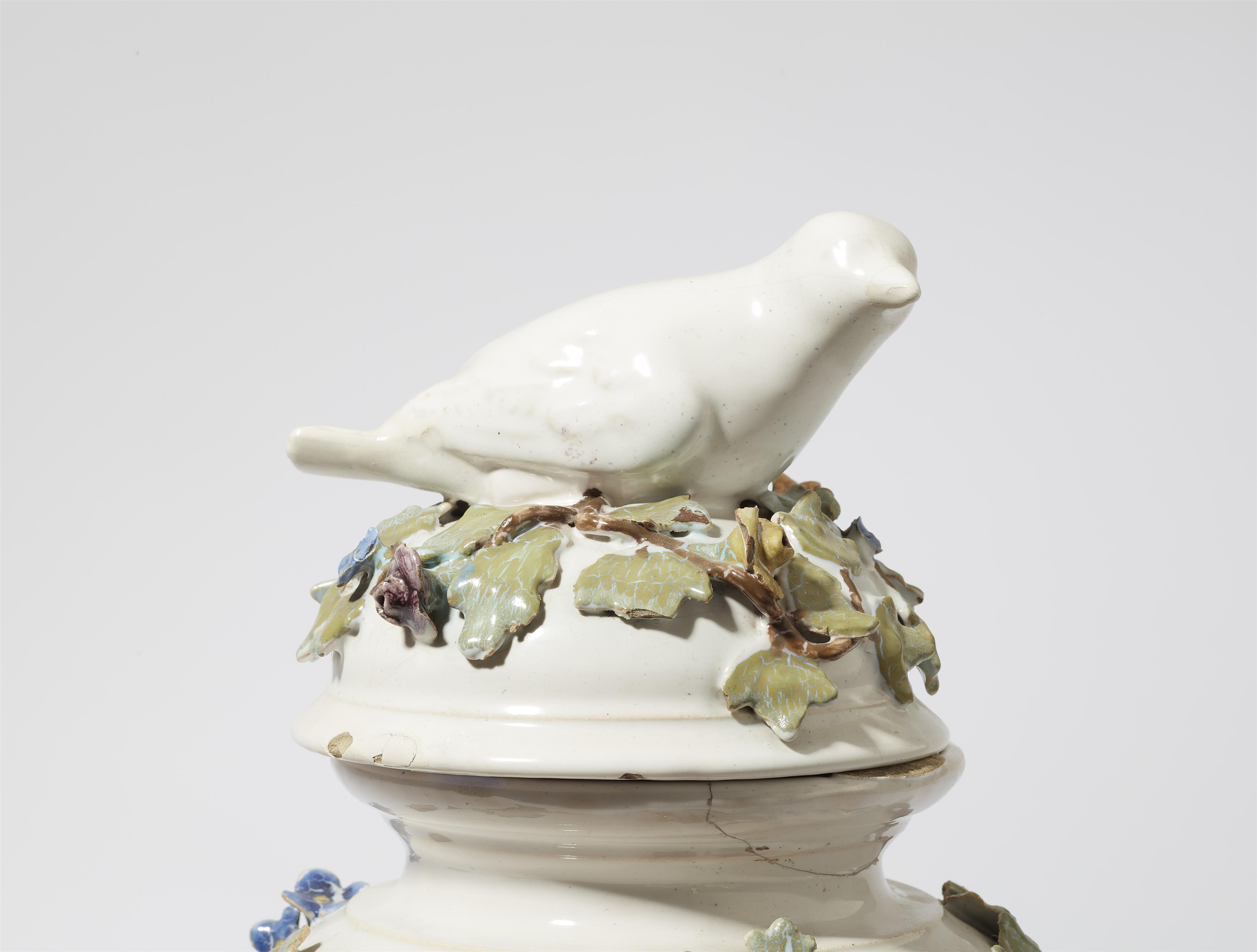 A faience vase with a bird finial - image-2