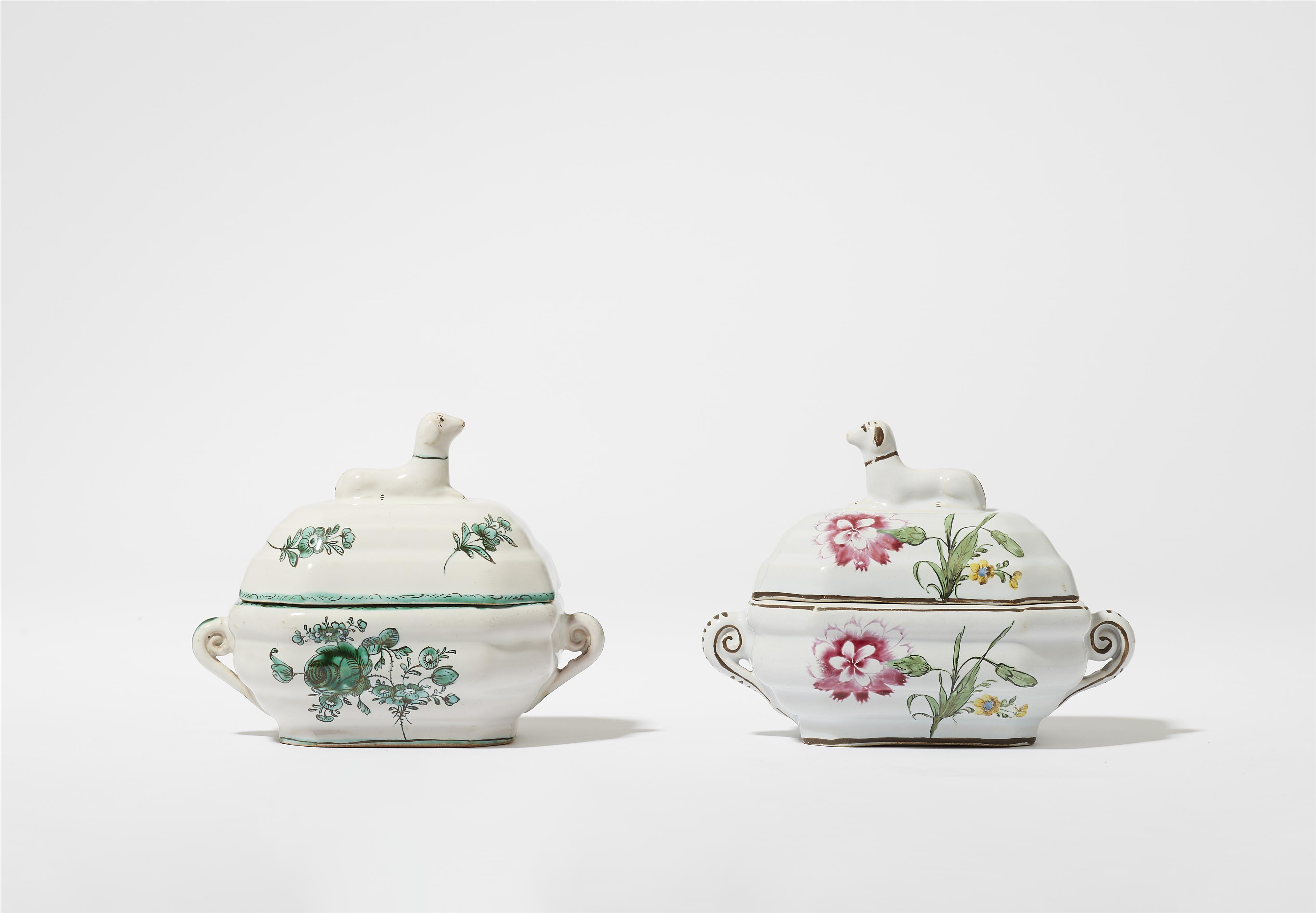 Two Proskau faience butter dishes with dog finials - image-1