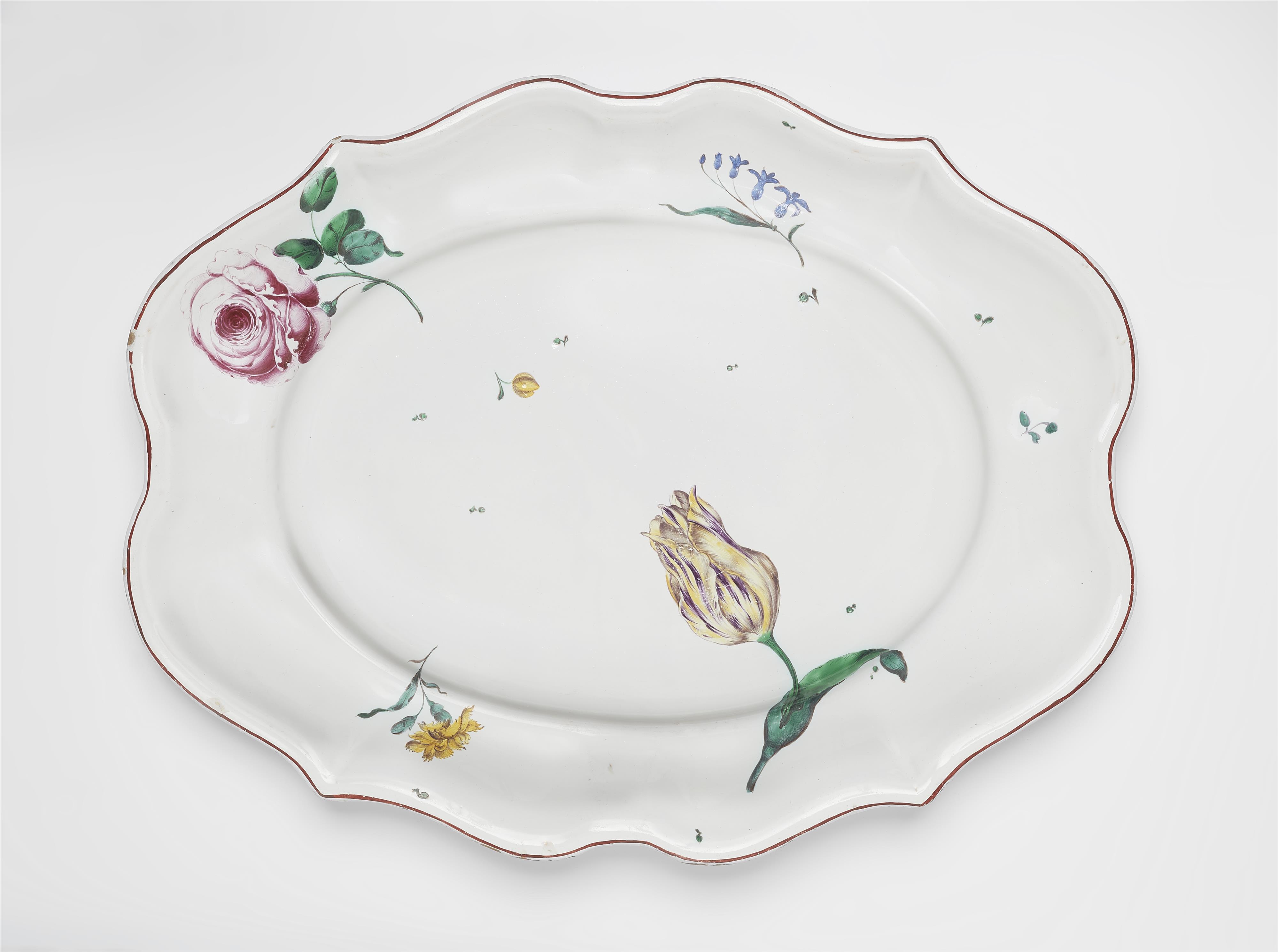 An oval Strasbourg faience platter with 'fleur fines' decor - image-1