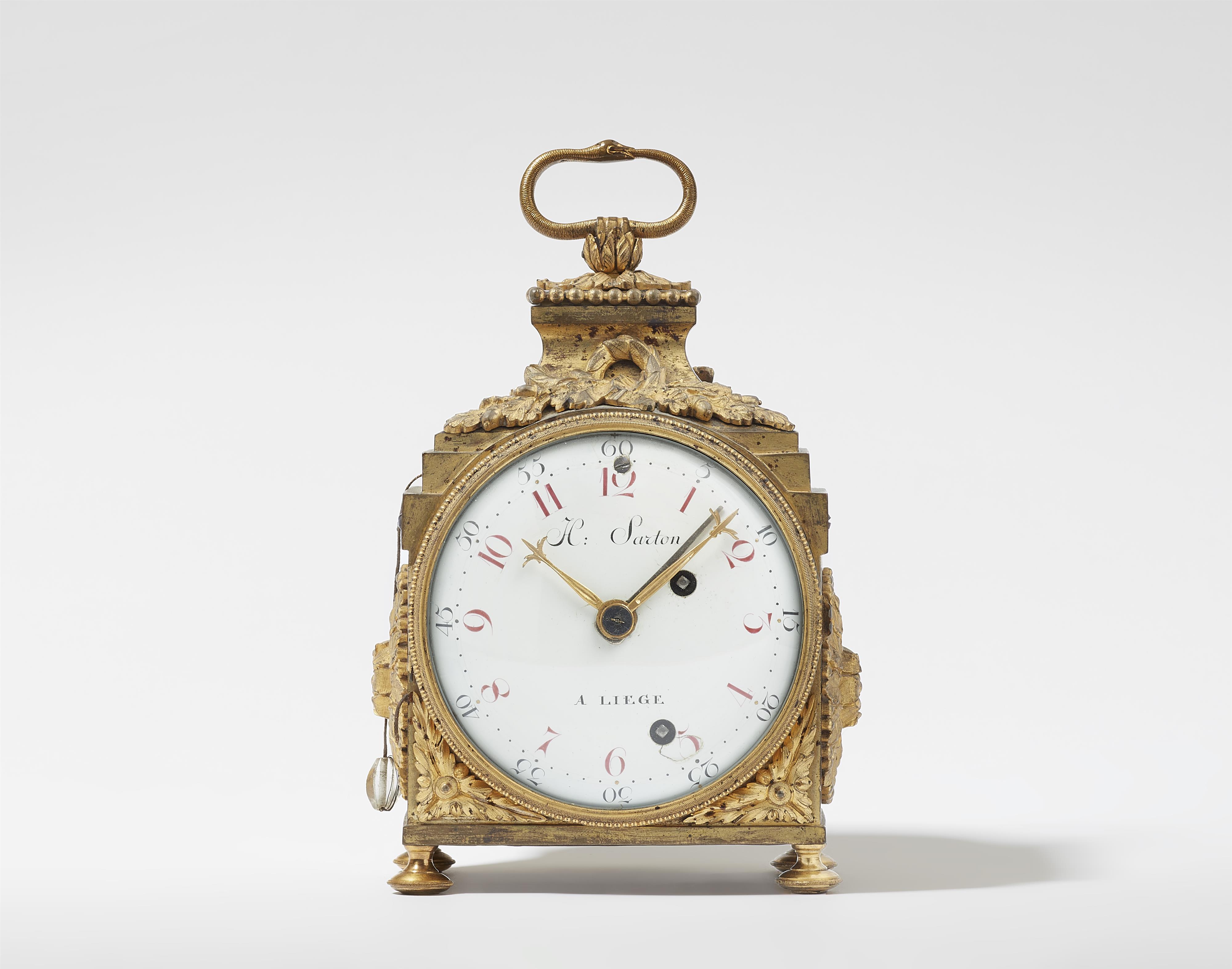 An officers travel clock by Hubert Sarton - image-1