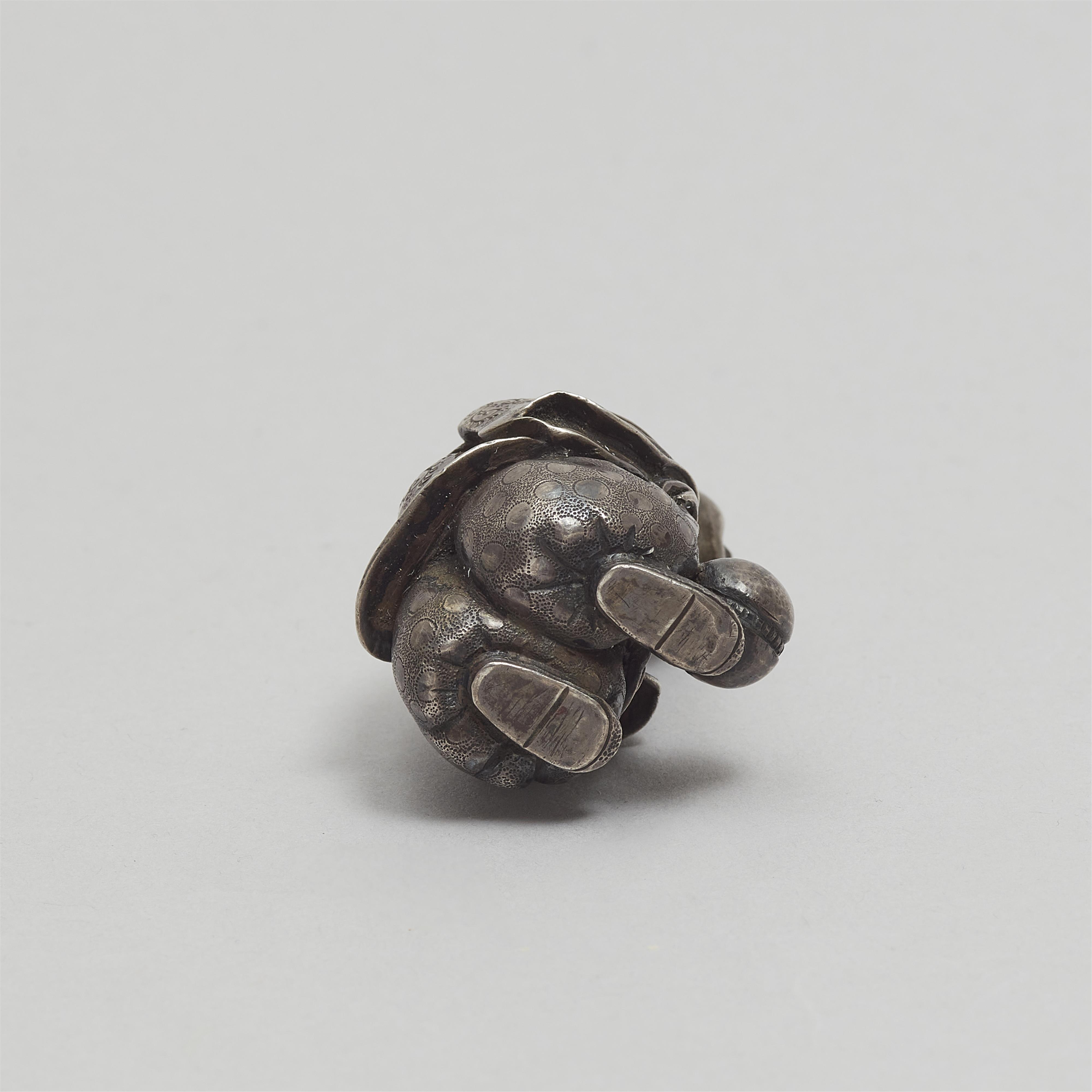 A silver netsuke of courtier playing foot ball. 19th century - image-7