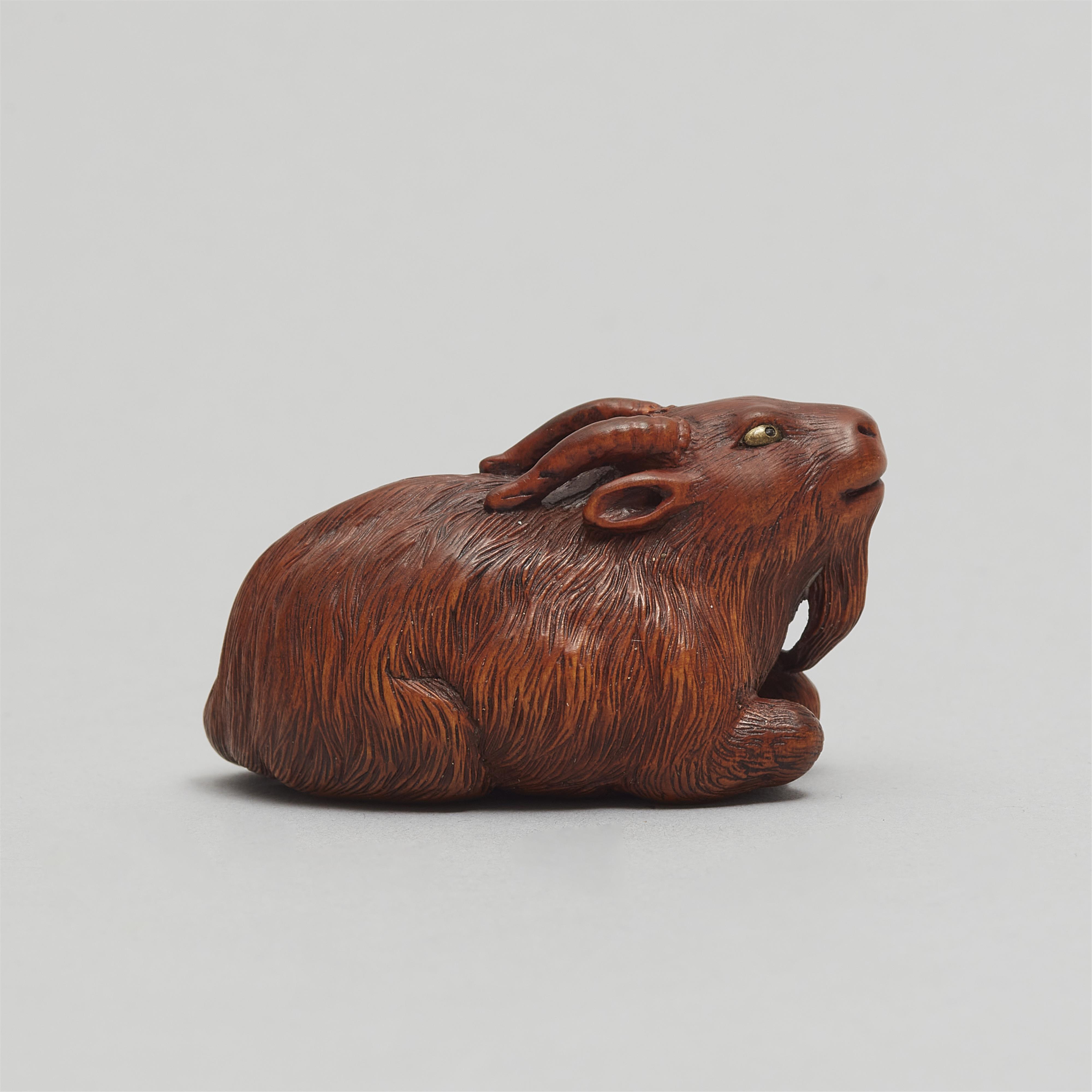 A boxwood netsuke of a reclining long-haired goat. Probably Tsu. First half 19th century - image-6