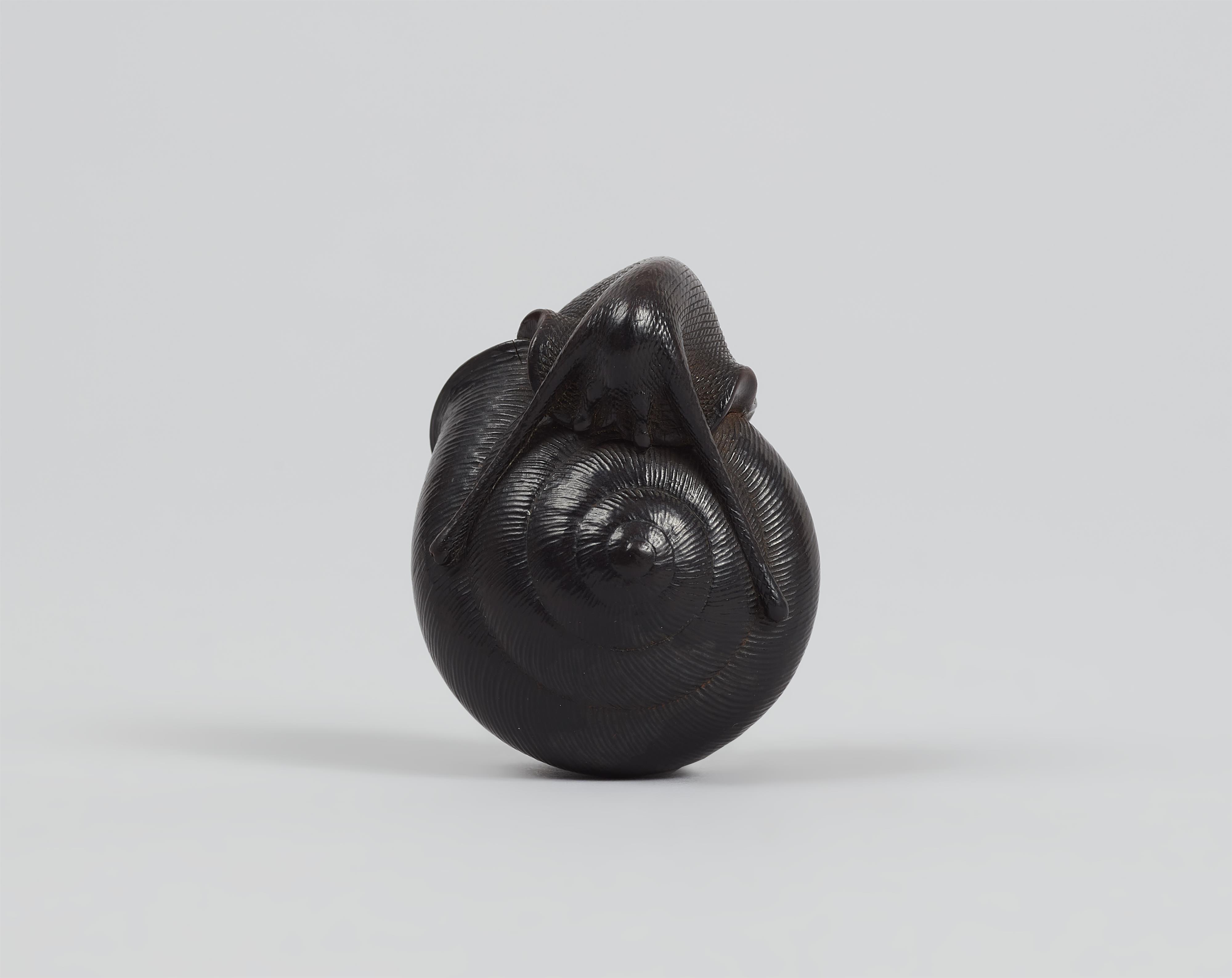 A dark stained boxwood netsuke of a snail. Nagoya. Mid-19th century - image-3