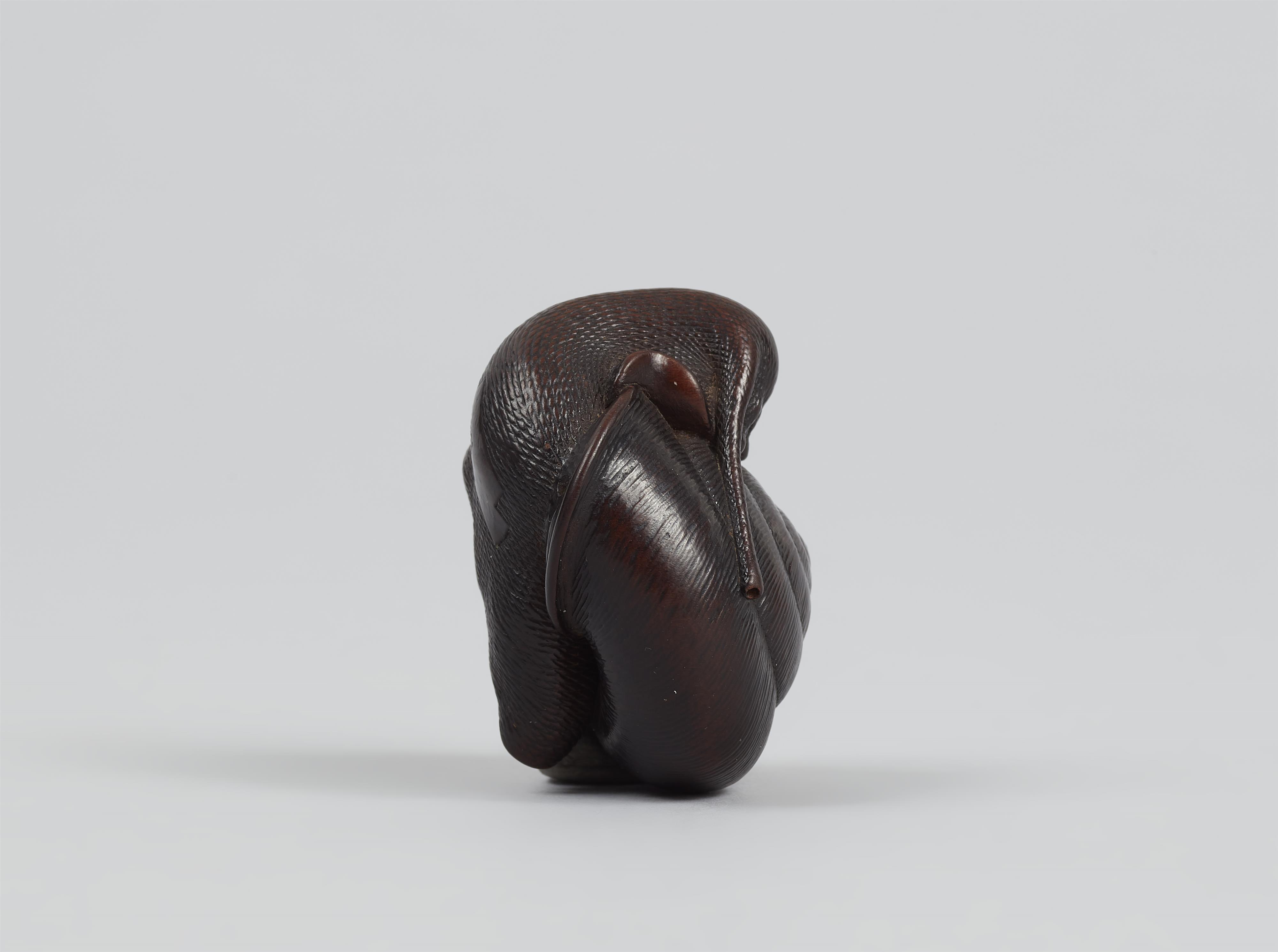 A dark stained boxwood netsuke of a snail. Nagoya. Mid-19th century - image-4