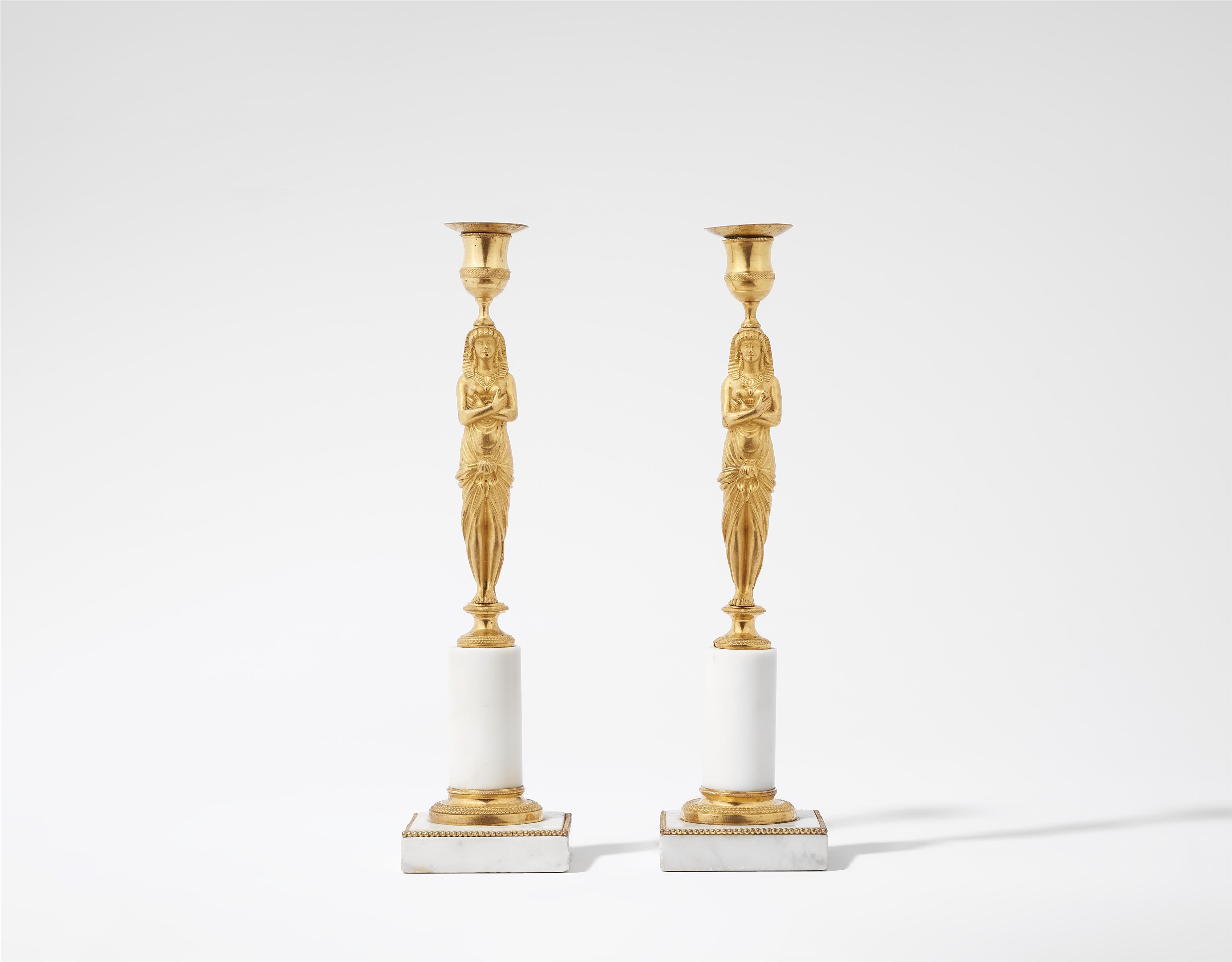 A pair of ormolu "retour d'égypte" candlesticks - image-1